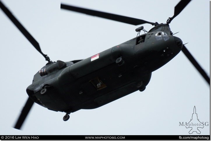 An aircrew specialist standing by the door of the CH47 Chinook