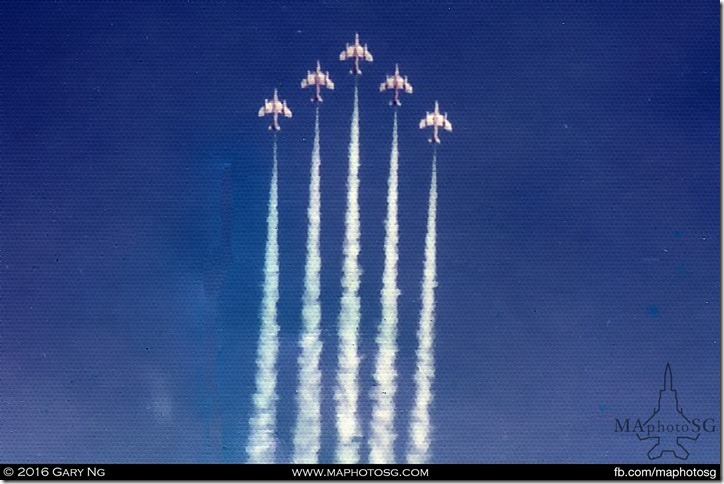 Black Knights performing a vertical loop in their Hawker Hunters, SAF Display, Changi Air Base, June 1975