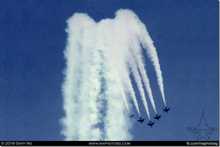 Black Knights rolling out of their vertical loop in their Hawker Hunters, SAF Display, Changi Air Base, June 1975