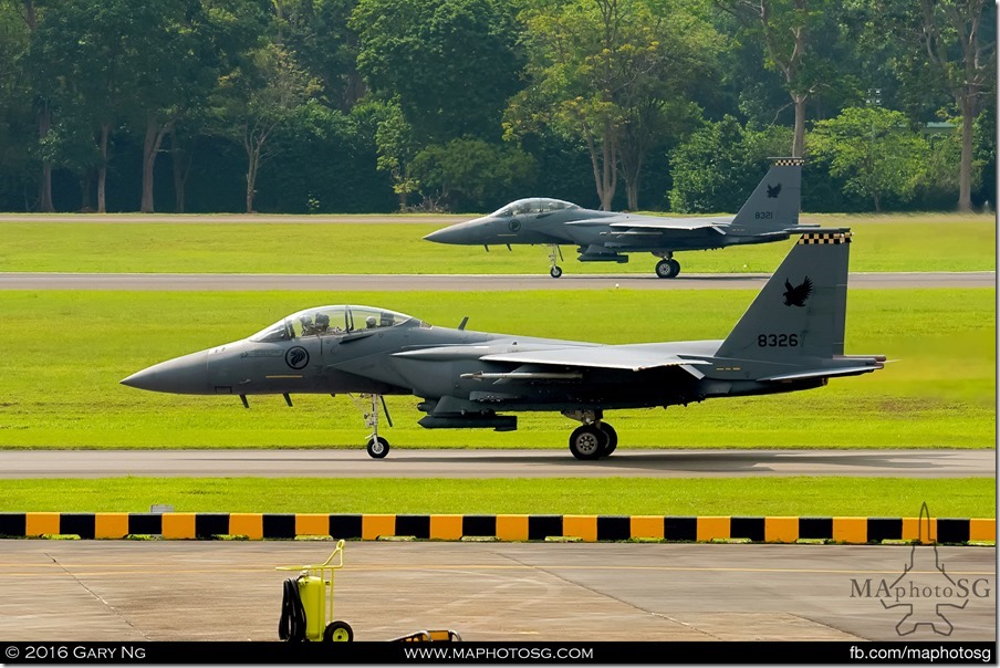 A pair of F-15SGs perform a simultaneous scramble takeoff during the Aerial Display preview session