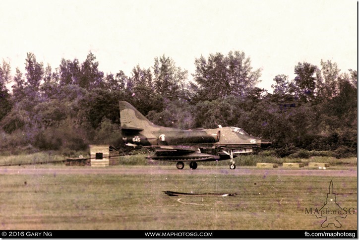 McDonnell Douglas A-4S Skyhawk performing an arrestor hook landing, SAF Display, Changi Air Base, June 1975