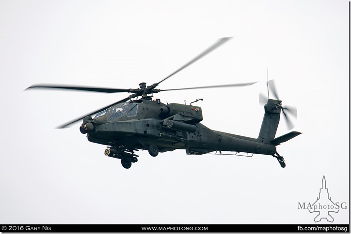 One of the pair of AH-64D Longbow Apache providing cover for the Chinook insertion