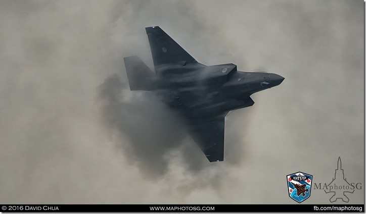 Massive condensation as the F-35A punches through smoke