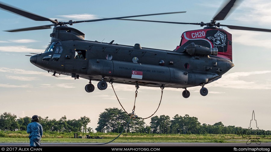 CH-47D Chinook lifts off once the 3 hooks are attached