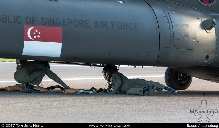 NDP 2017 Flag flypast: RSAF Air Crew Specialist hooking up the flagon Pulua Sudong