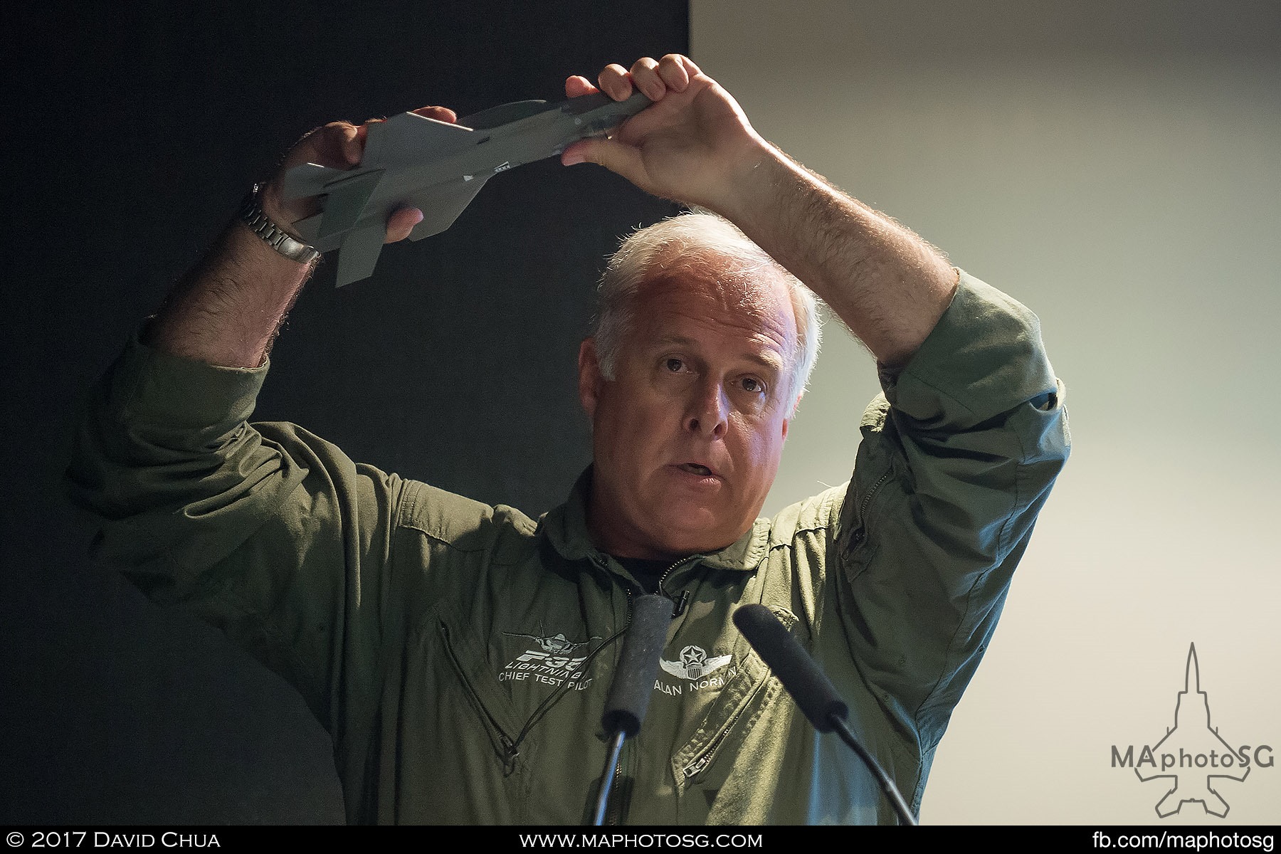 3. Lockheed Martin chief test pilot Alan Norman shows how the F-35A aerial display will look like using a model as he goes through the whole segment of the demo during a press conference.