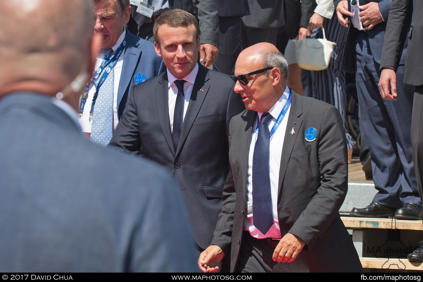 6. French President Emmanuel Macron walks with Dassault Aviation CEO Eric Trappier after watching the demonstration flights at the GIFAS Chalet. Macron landed at Le  Bourget in an Airbus A400M military transport plane to launch the Paris Air Show.
