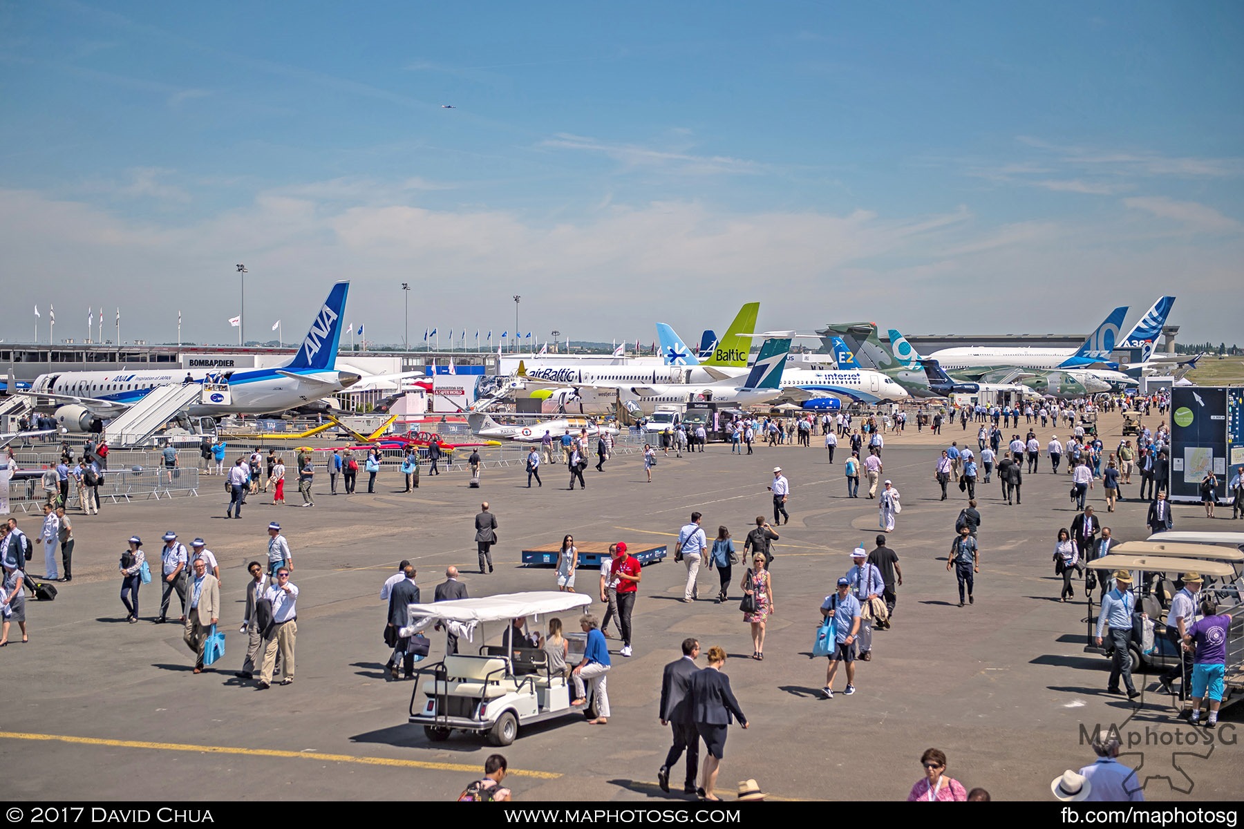 40. Part of the Static Display Area as viewed from the top deck of the Media Centre. Some notable tails are the MRJ, CS300, Q400, Superjet 100, E195-E2, B787-10, B737 Max C295 and A380plus.