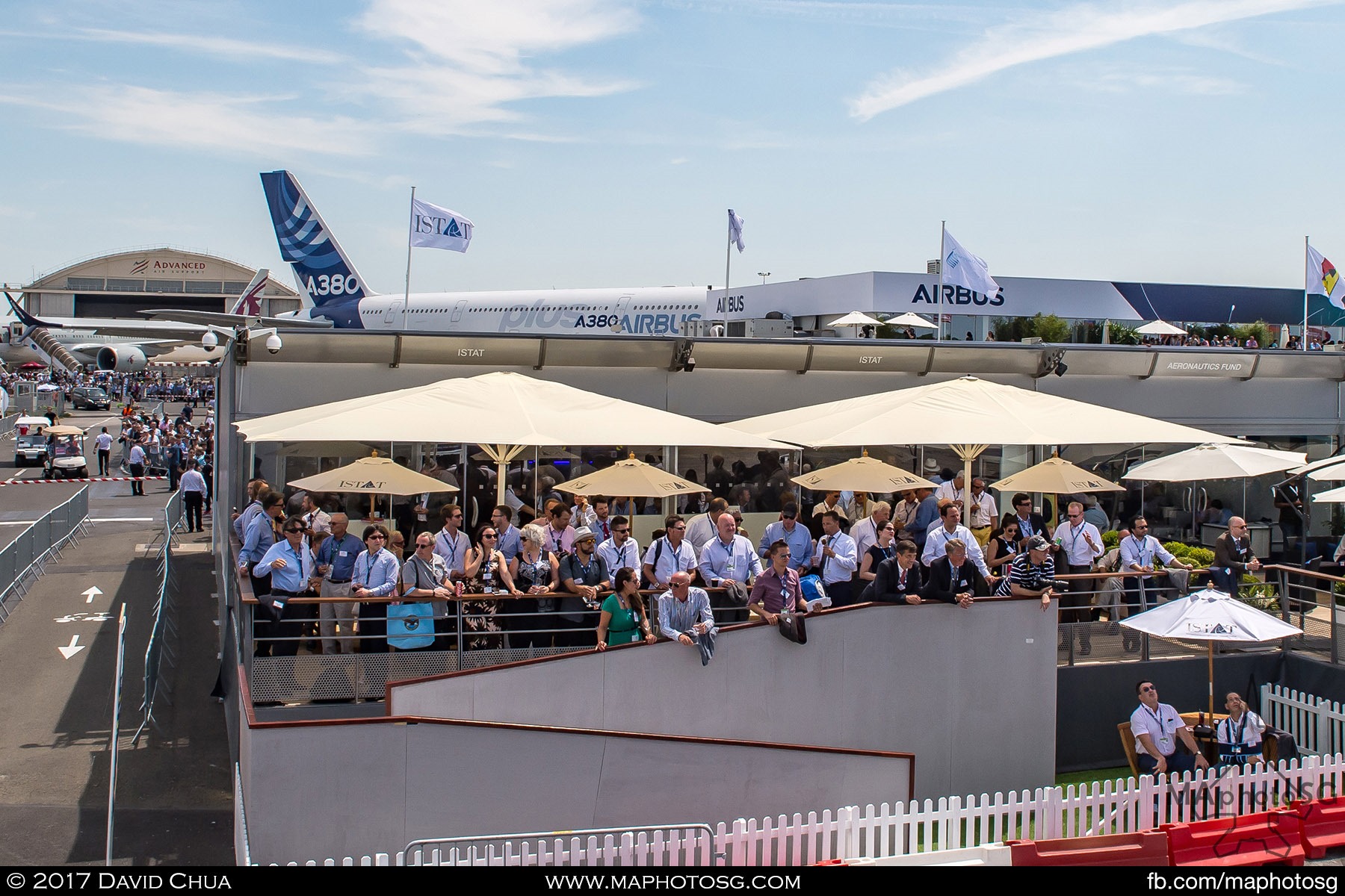 27. Invited guests of ISTAT views the daily aerial demonstration displays from the balcony of their chalet.