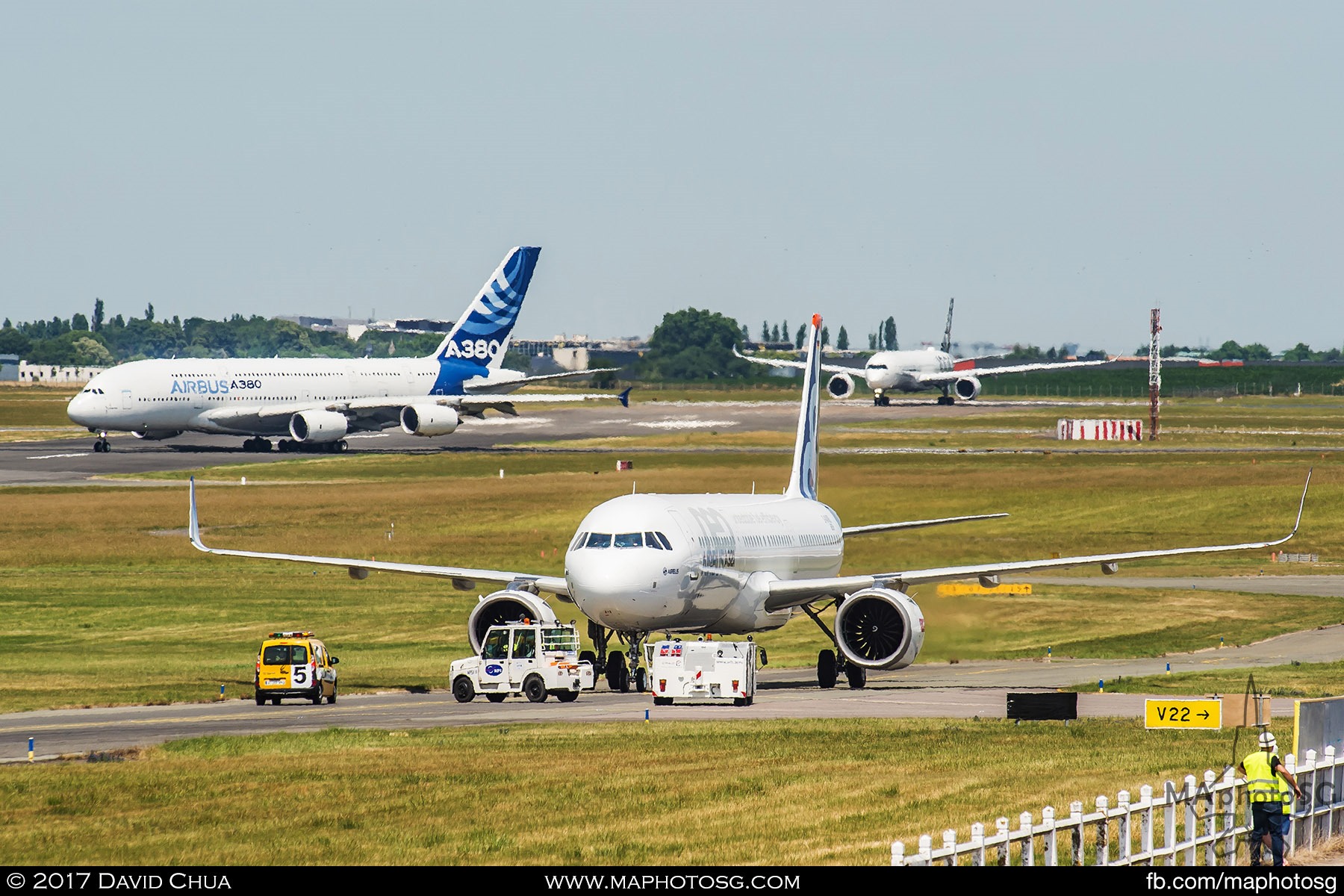 34. A trio of Airbuses on the tarmac at the same time. The A320neo in the centre taxiing back after it’s demonstration flight while an A380-800 crosses the runway to prepare for it’s display while the A350-1000 is at the end of the runway ready for take off once the A380-800 clears.