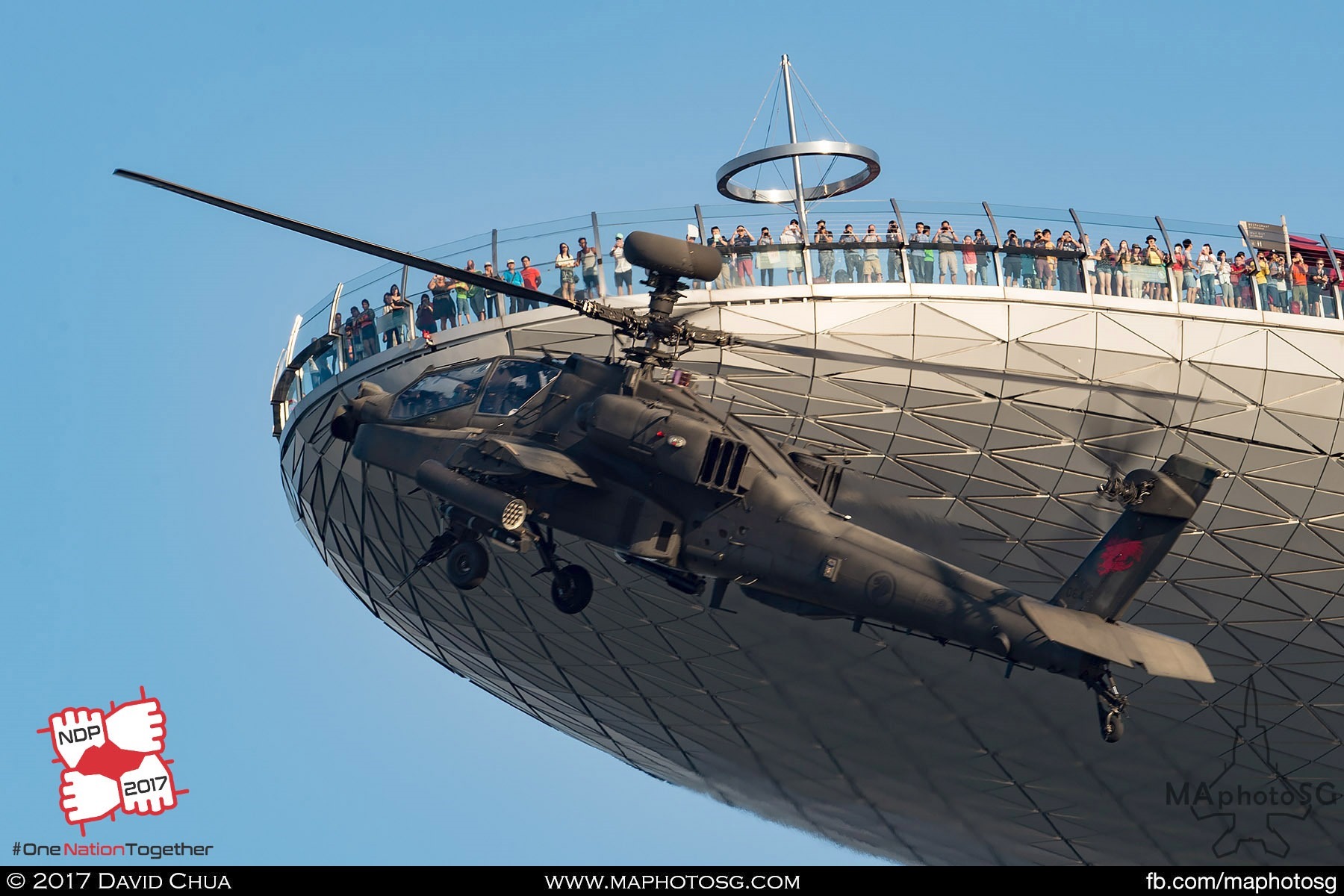 9. Crowd at Marina Bay Sands Skypark where treated to a great show as the AH-64D Apache Longbow crosses their cameras.