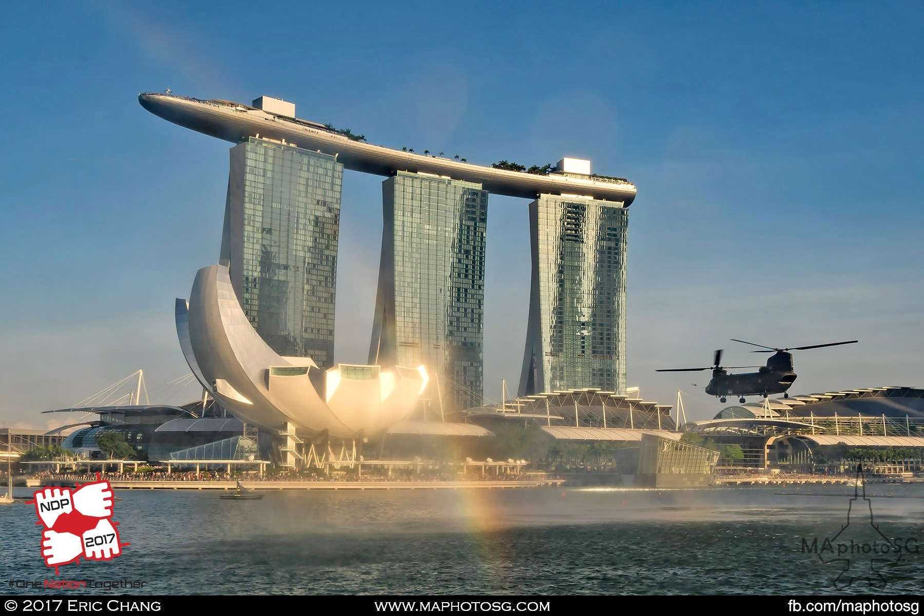 11. Rainbow formed due to the water spray created by the powerful rotors of the CH-47D Chinook as it descends for insertion