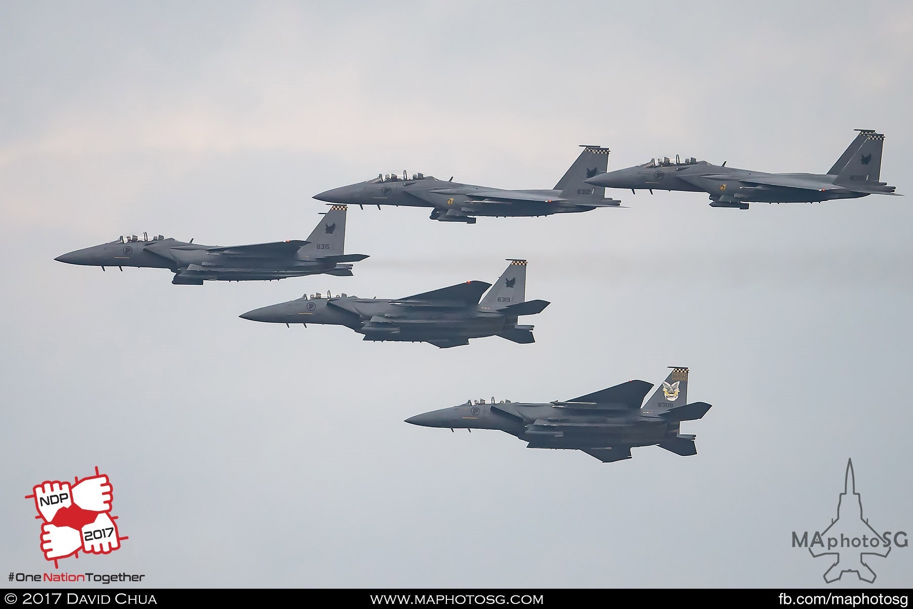 21. Five F-15SG Strike Eagles from 149 Squadron flies in formation to perform the Salute to the Nation bomb burst.