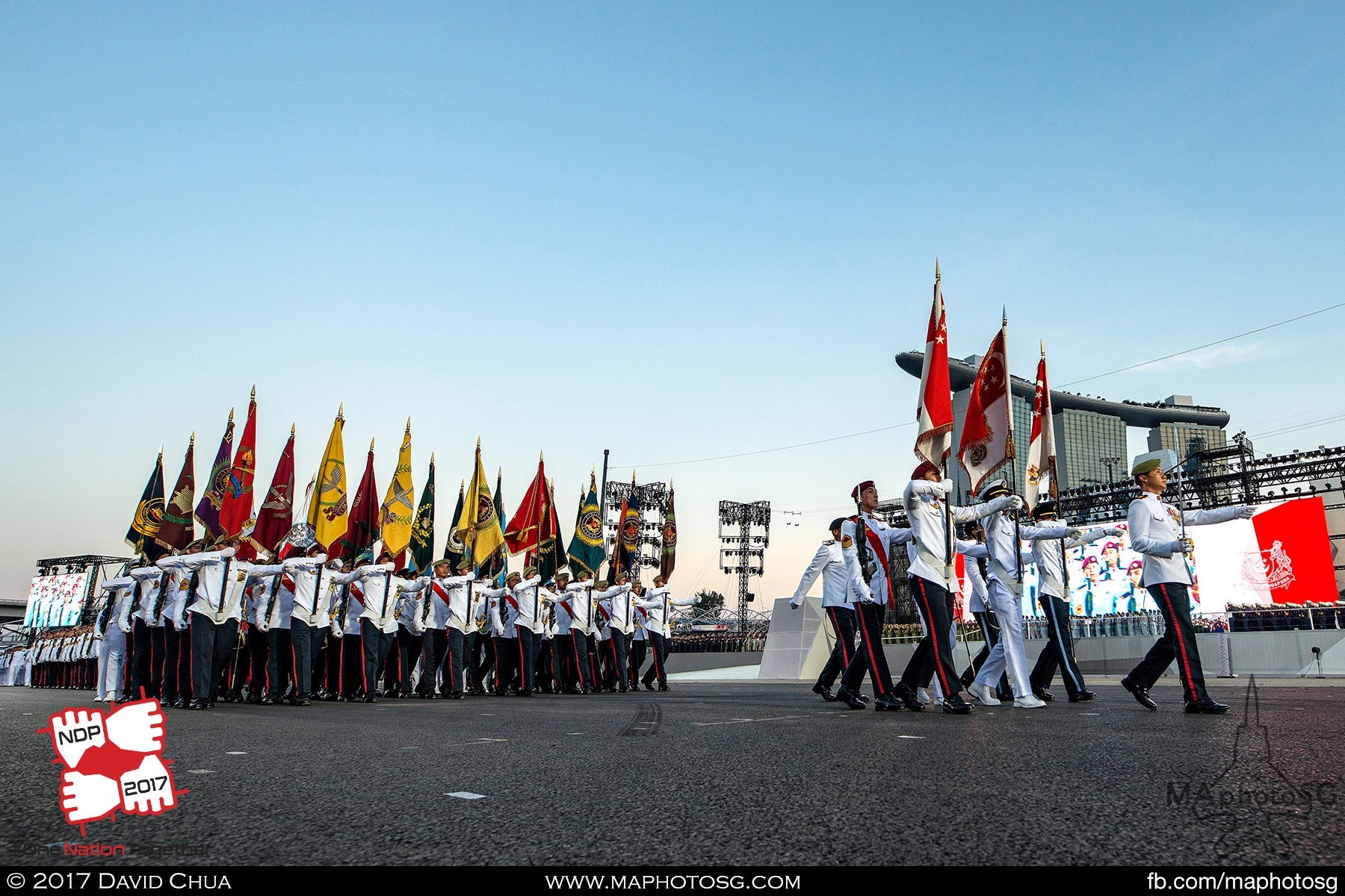 30. State Colours and Regimental Colours parties march pass lead by Parade Commander LTC (NS) Lim Wee Tee.