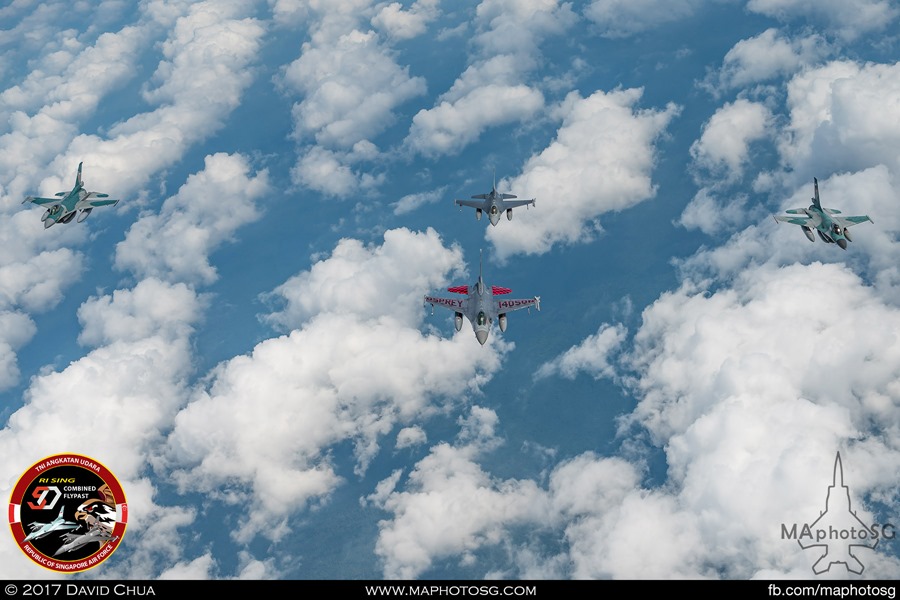 Two RSAF F-16s(front and back) and two TNI-AU F-16s(left and right) conducting work-up training for the combined flypast within Singapore and Indonesia airspace