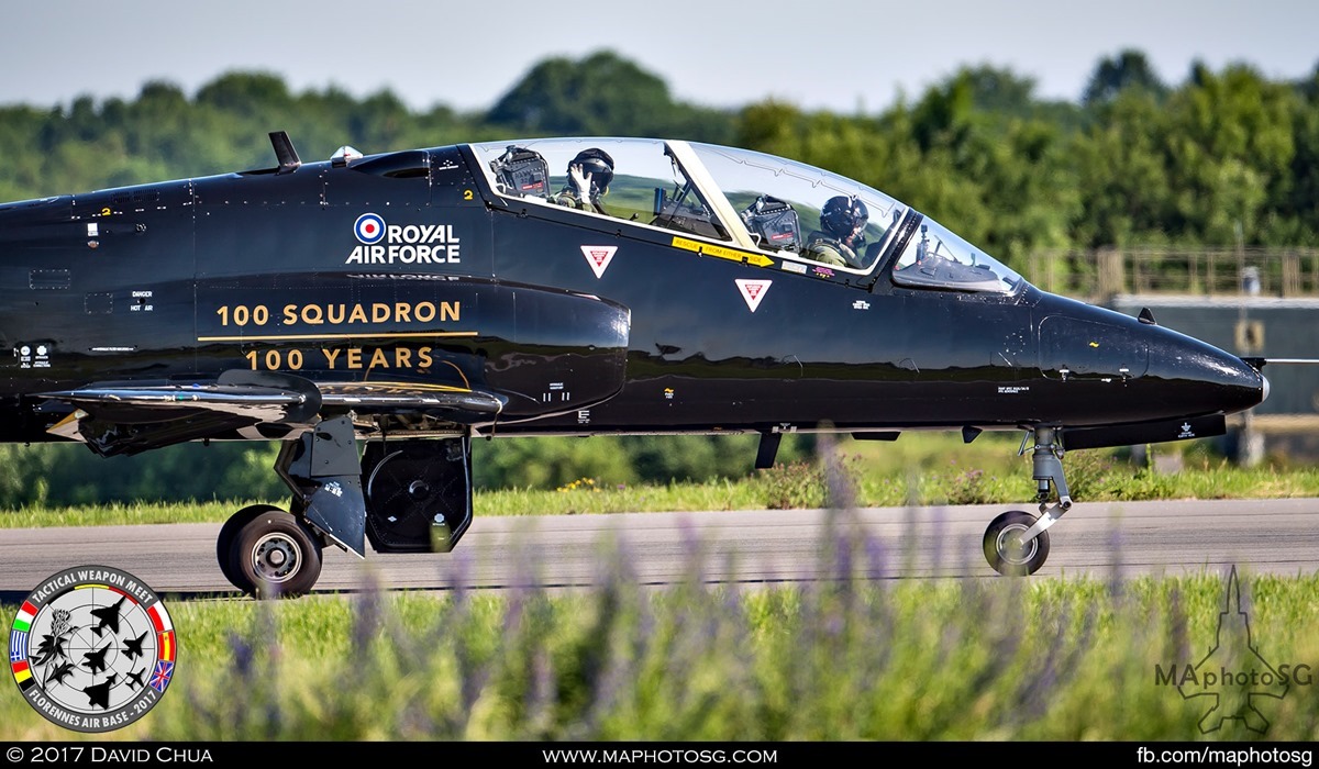 5. Crew of the Royal Air Force Hawk T1 (XX285) in 100 Years livery waves as it taxis past. Aircraft is from the RAF No 100 Squadron also celebrating it’s centenary.