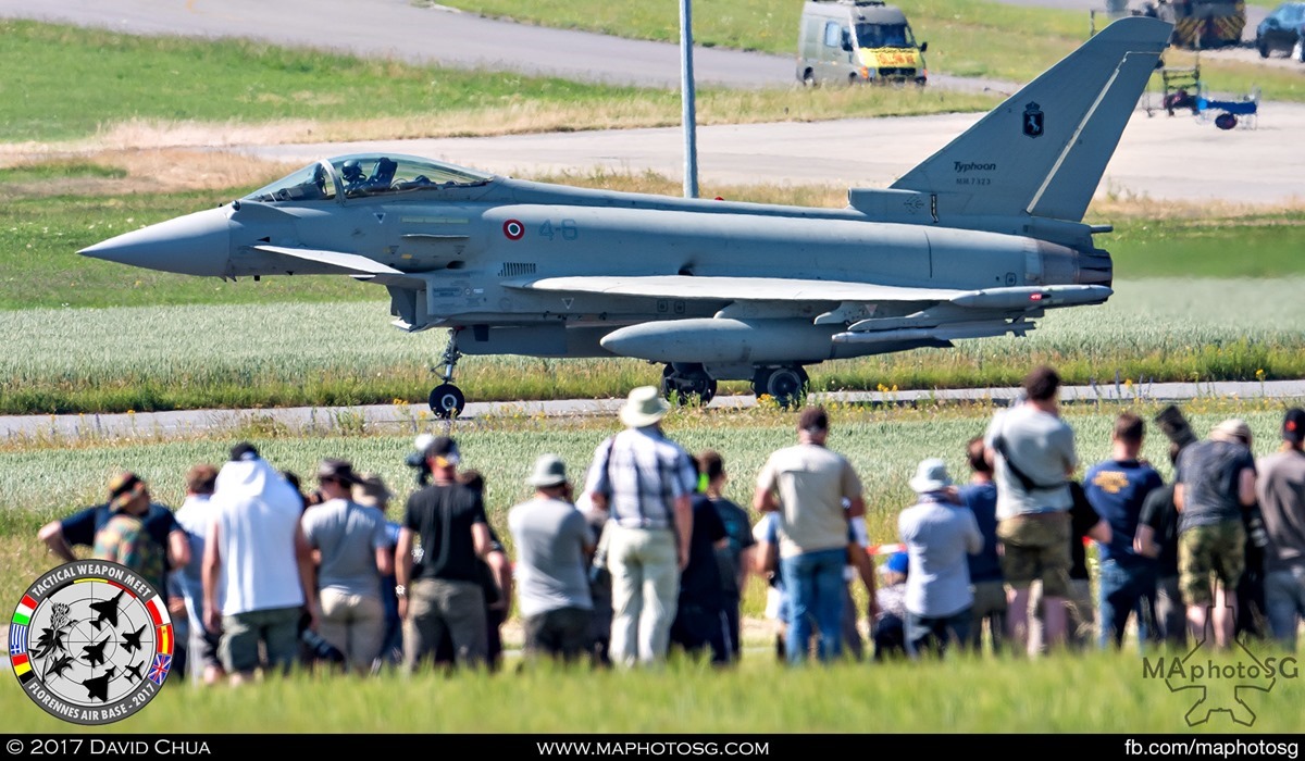 28. Crowd gathers in anticipation as an Italian Air Force Eurofighter Typhoon (4-6) from 4° Stormo started moving from the parking area.