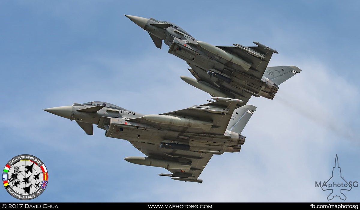 33. A pair of Spanish Air Force Eurofighter Typhoons (11-28 and 11-12) from Ala 11 breaks formation as it over flies the airfield.