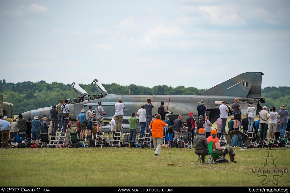 The crowd gathers as one of the Phantoms taxis past after landing 