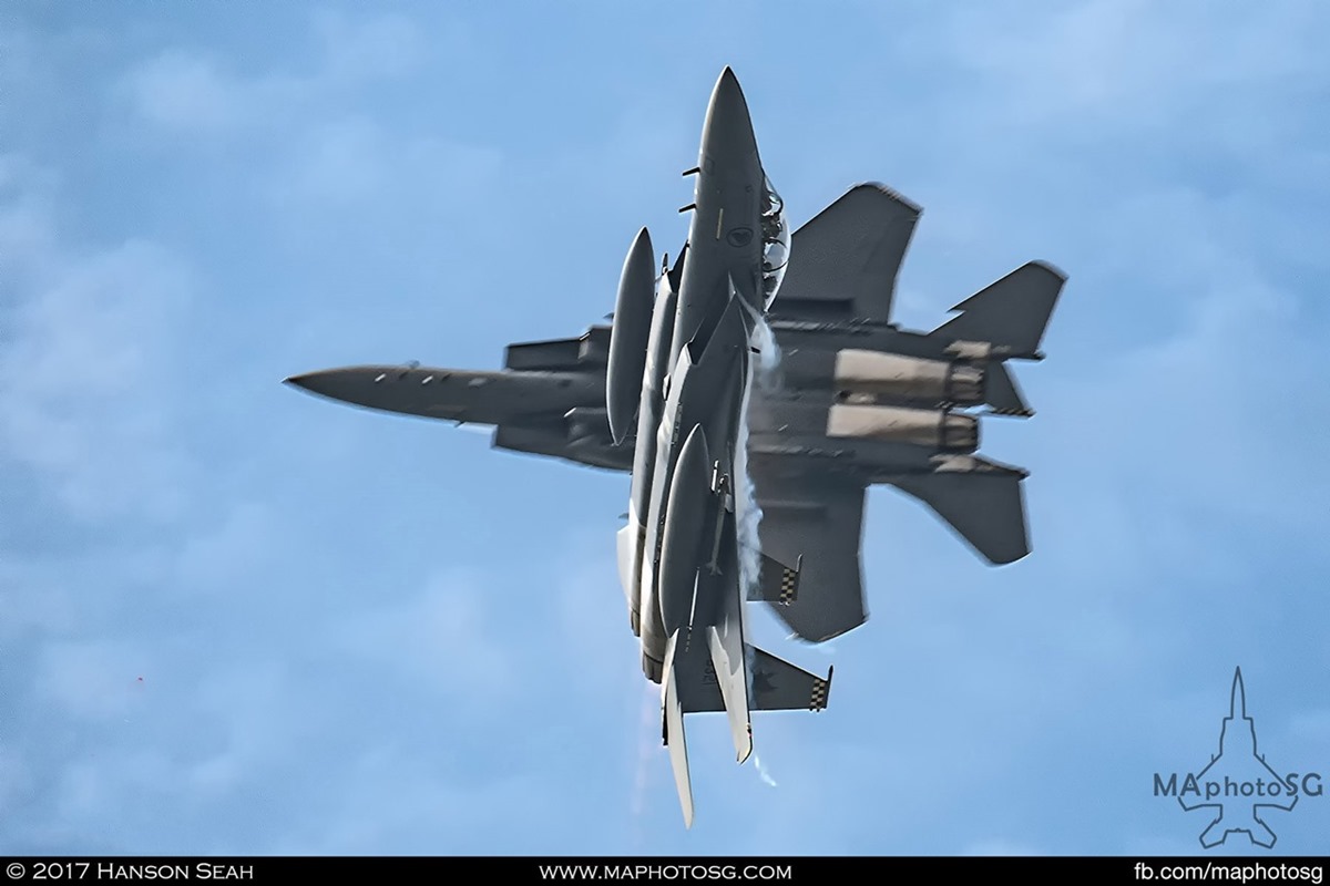 Two F-15SG Strike Eagles of the RSAF performs a shackle cross at show center to start the Dynamic Defence Display segment of the show.