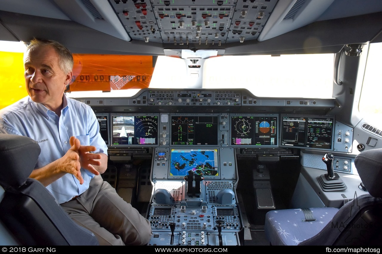 Airbus test pilot sits inside the cockpit of the Airbus A350-1000