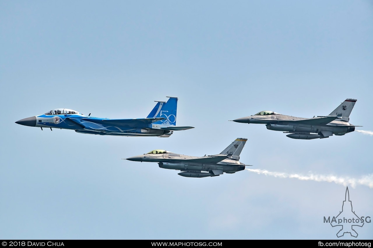 RSAF Aerial Display Team enters the show centre in arrowhead formation