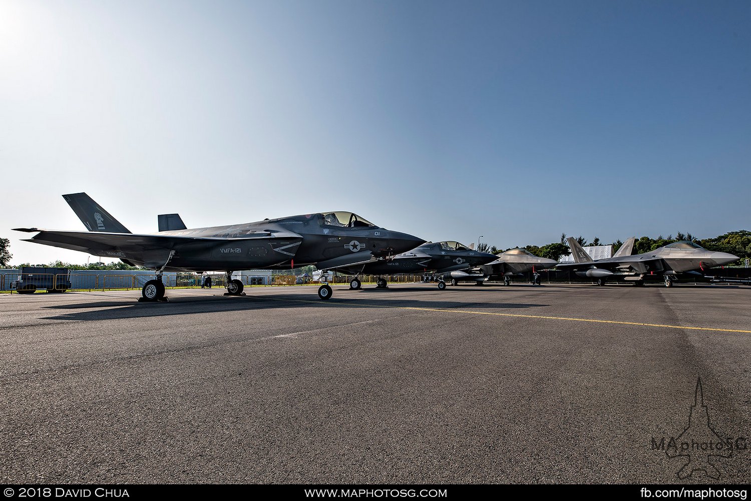 USMC VMFA-121 Lockheed Martin F-35B Lightning IIs (169164, 164166) and USAF 525th FS Lockheed Martin F-22A Raptors (06-115, 06-127)