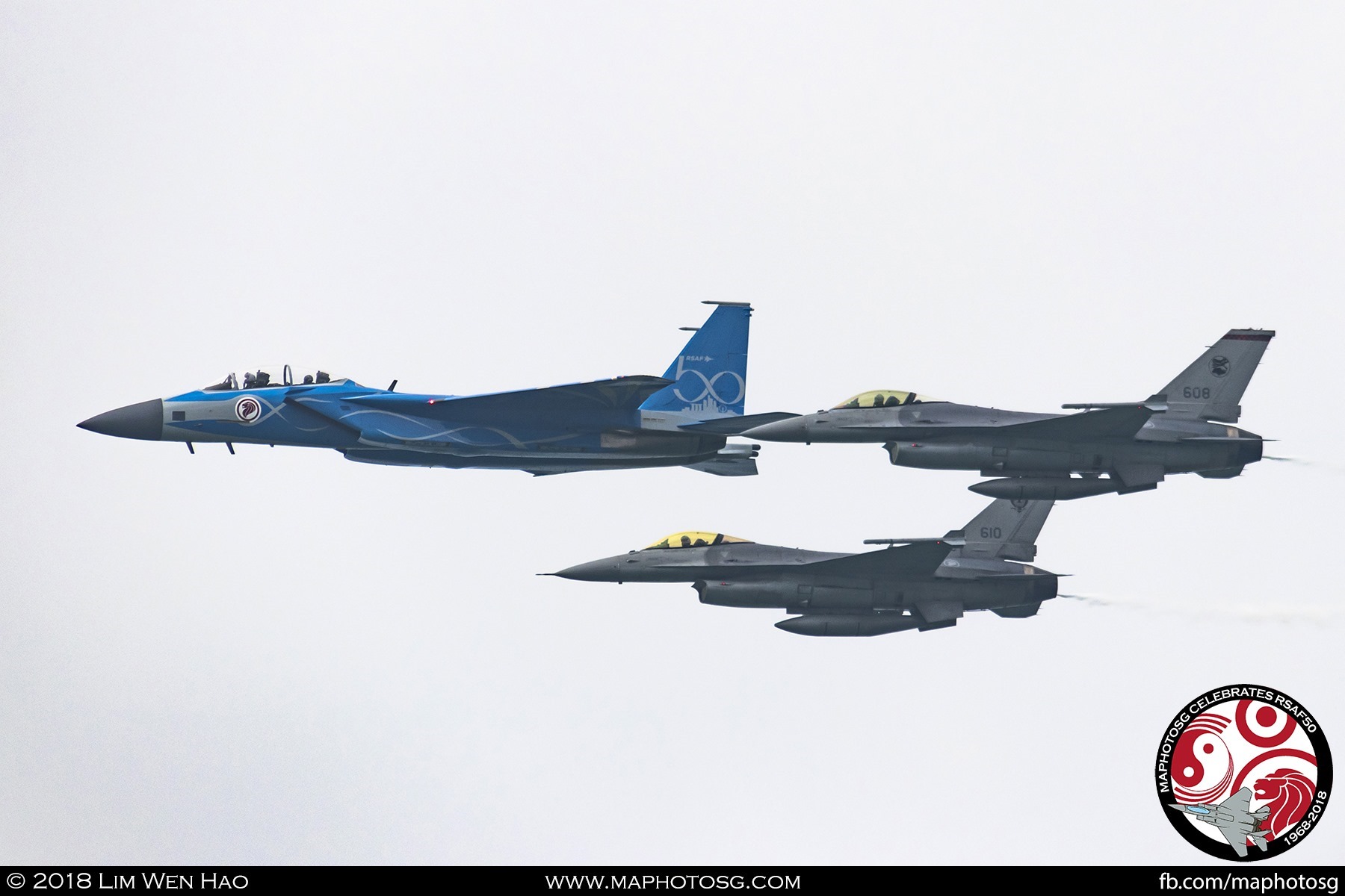 Making entry into show centre from the right, RSAF50 themed F-15SG and two F-16C in Arrowhead Formation.