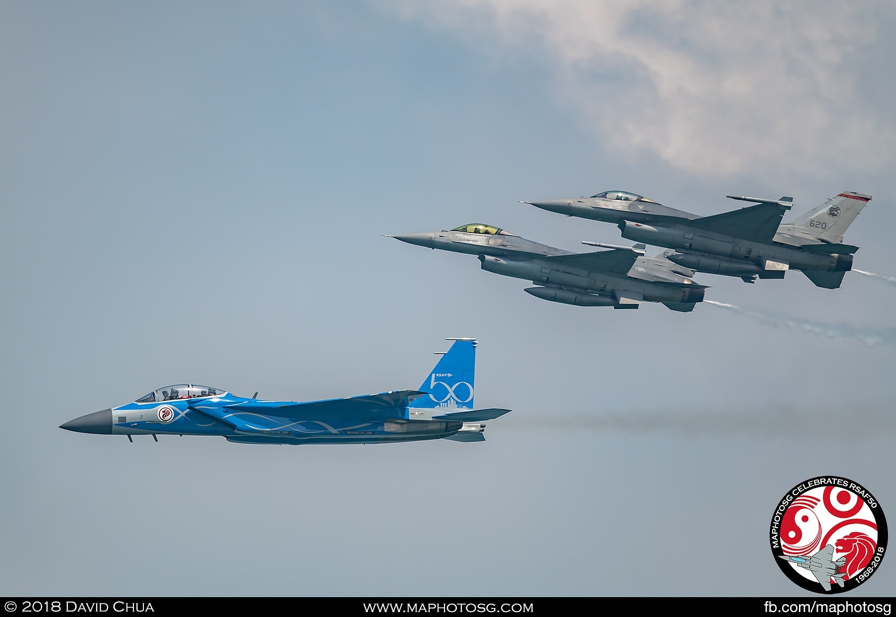 Two F-16s break formation for the Vertical Split.