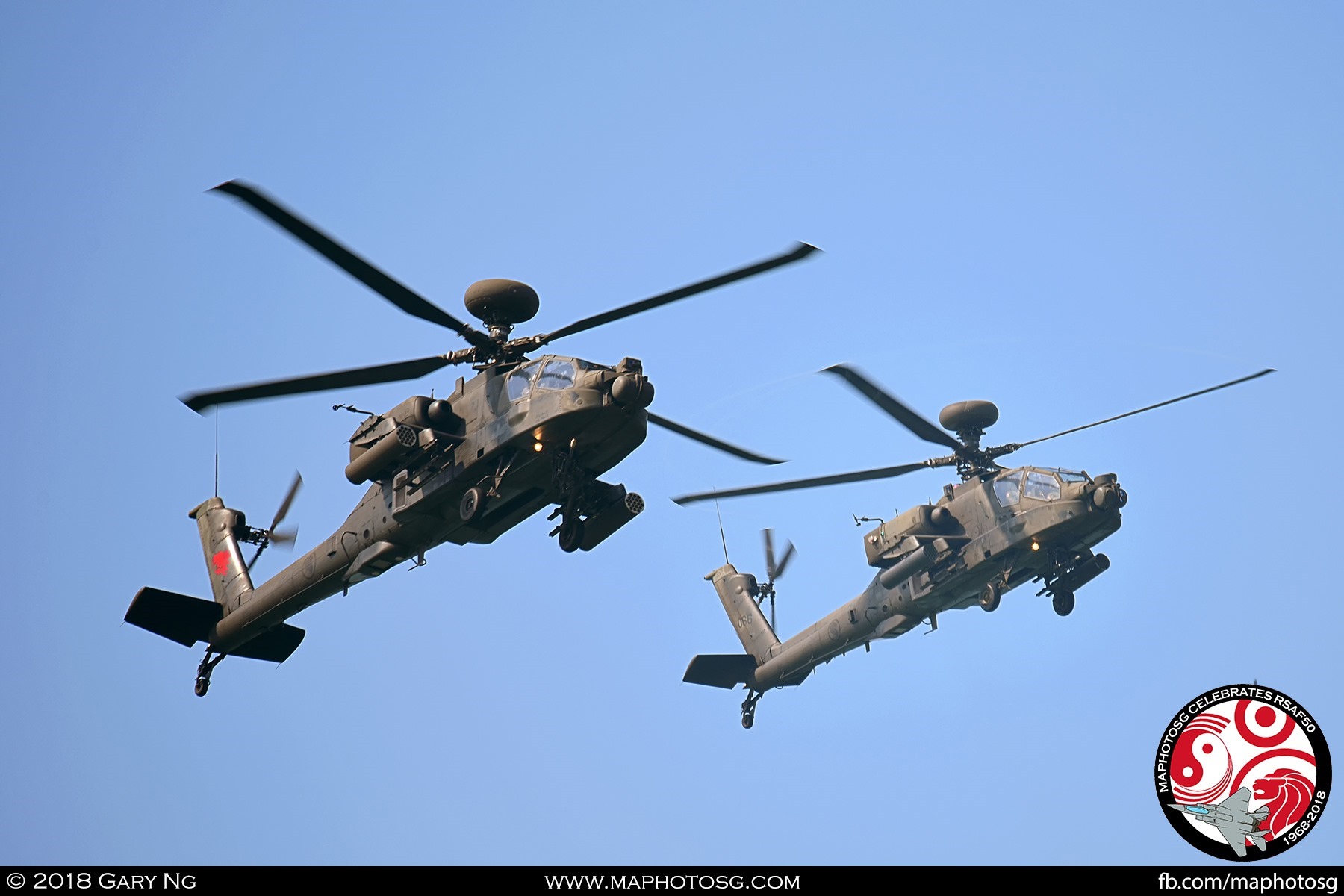 Starting the Aerial Display segment are two AH-64D Apache Longbow attack helicopters, Redhawks 1 and 2 from 120 Squadron entering from the front of show centre.