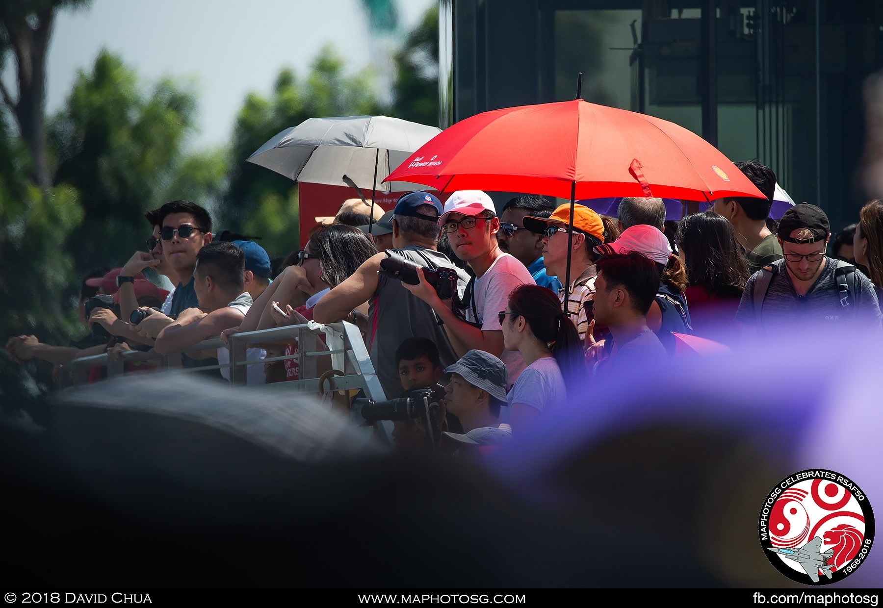 Part of the 10000 strong crowd on the roof of the Marina Barrage awaits the flying display.