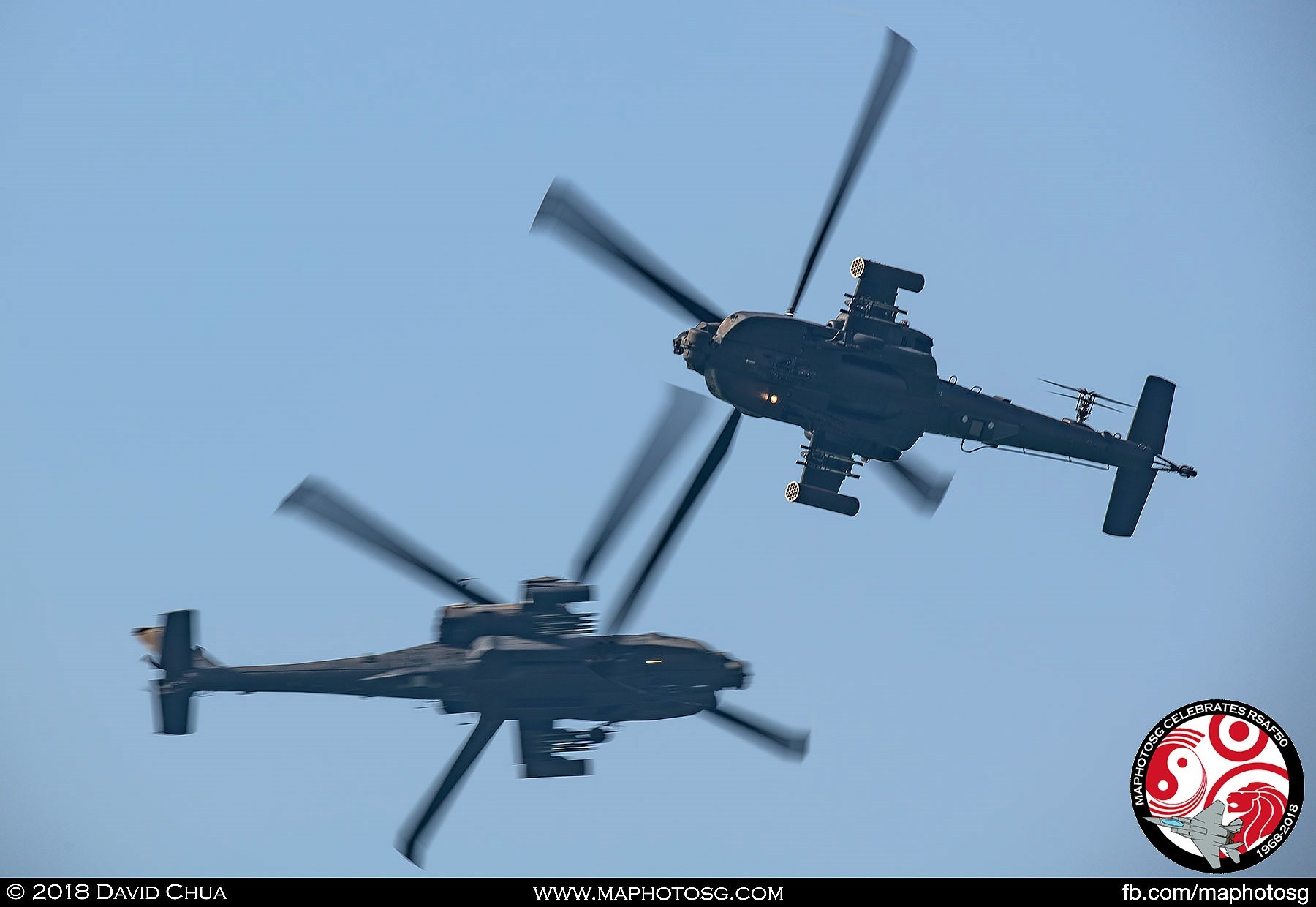 The two AH-64D helicopters break into each other and make a 90-degree turn as they approach the show centre to perform the Cross Dagger.