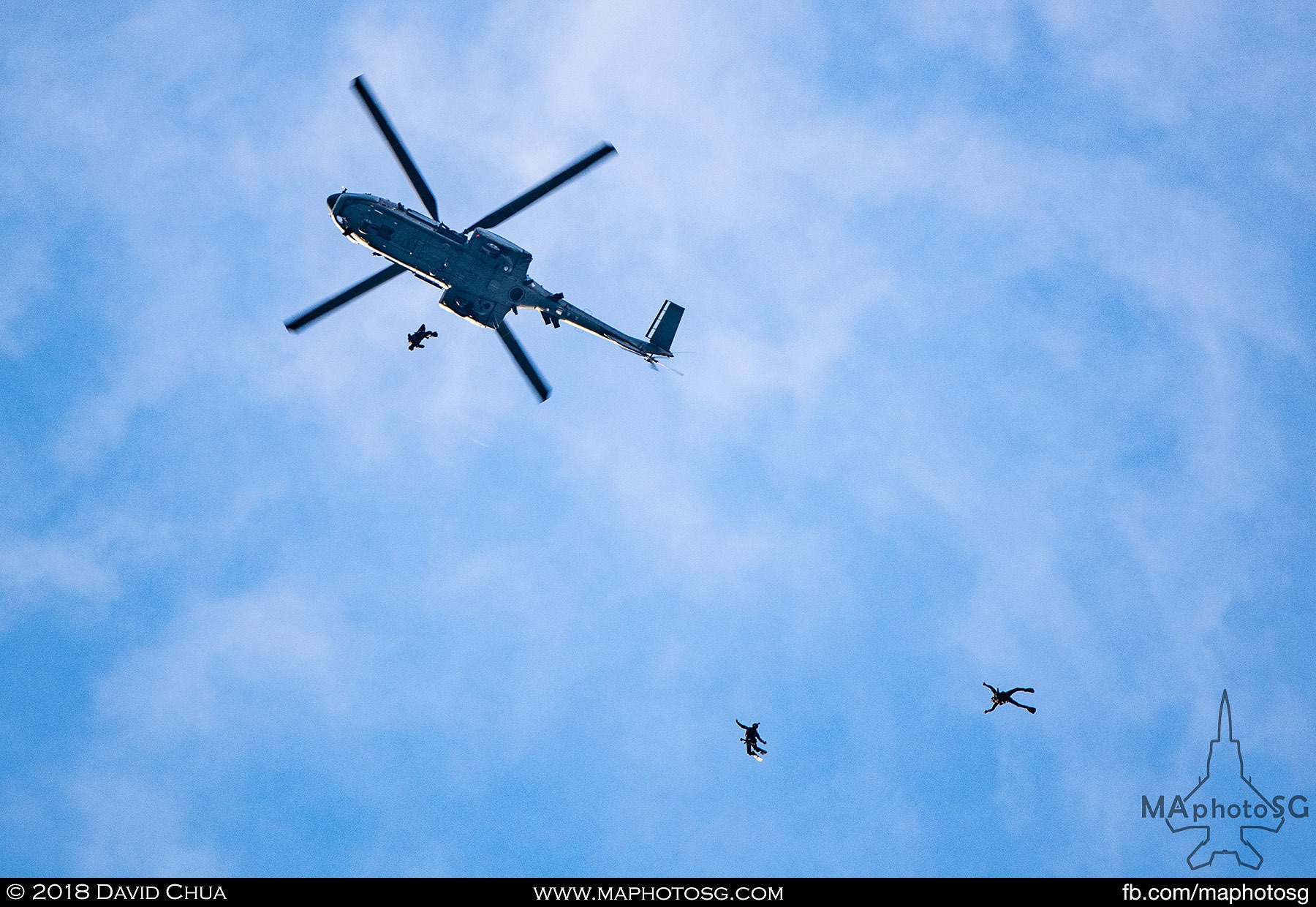 04. For the first time in NDP, 8 divers from the Naval Diving Unit performs a combat jump from a RSAF AS332M Super Puma helicopter a 1800m.