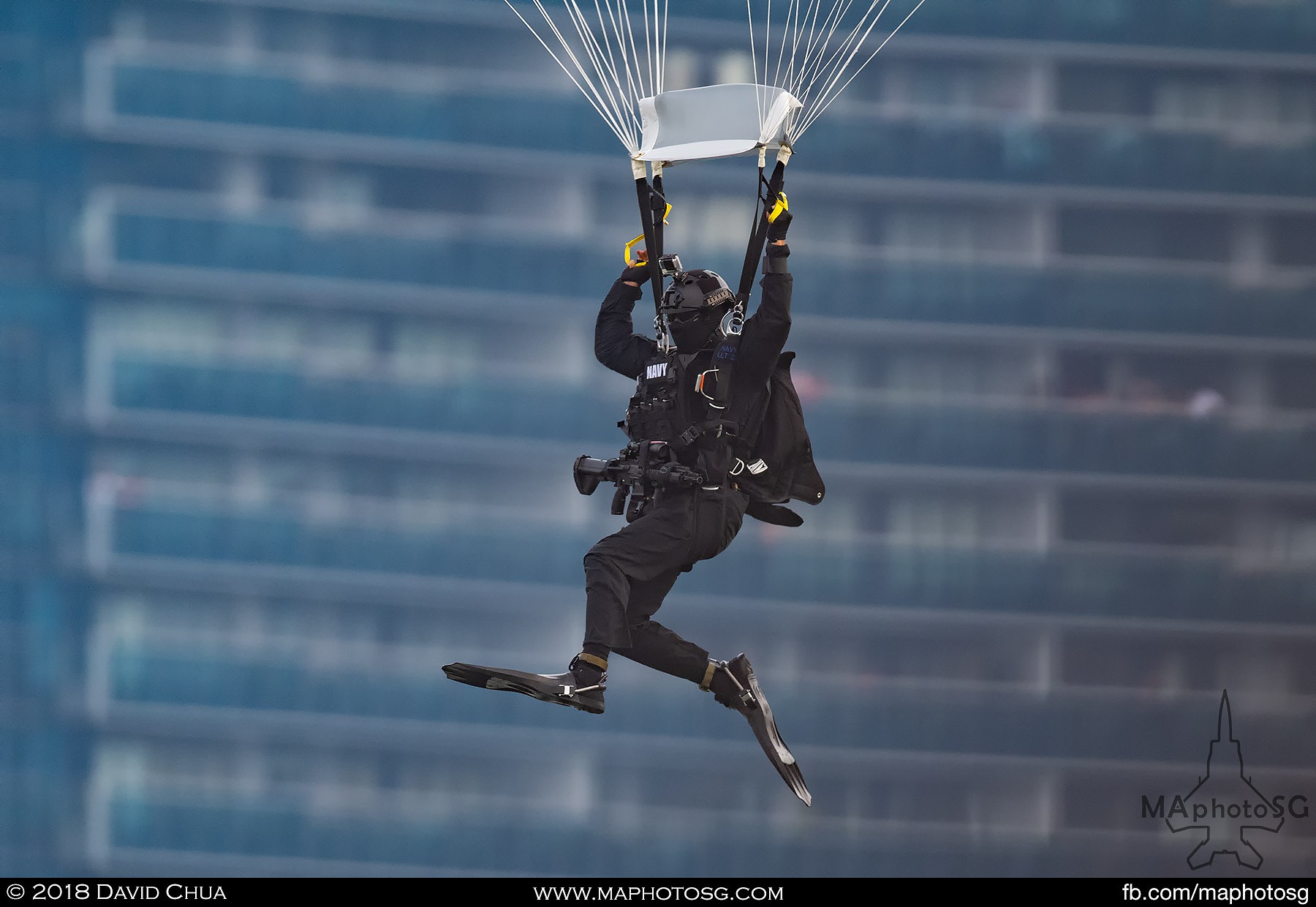 05. Close up view of a diver carrying gear weighing 50kg and wearing dive fins.