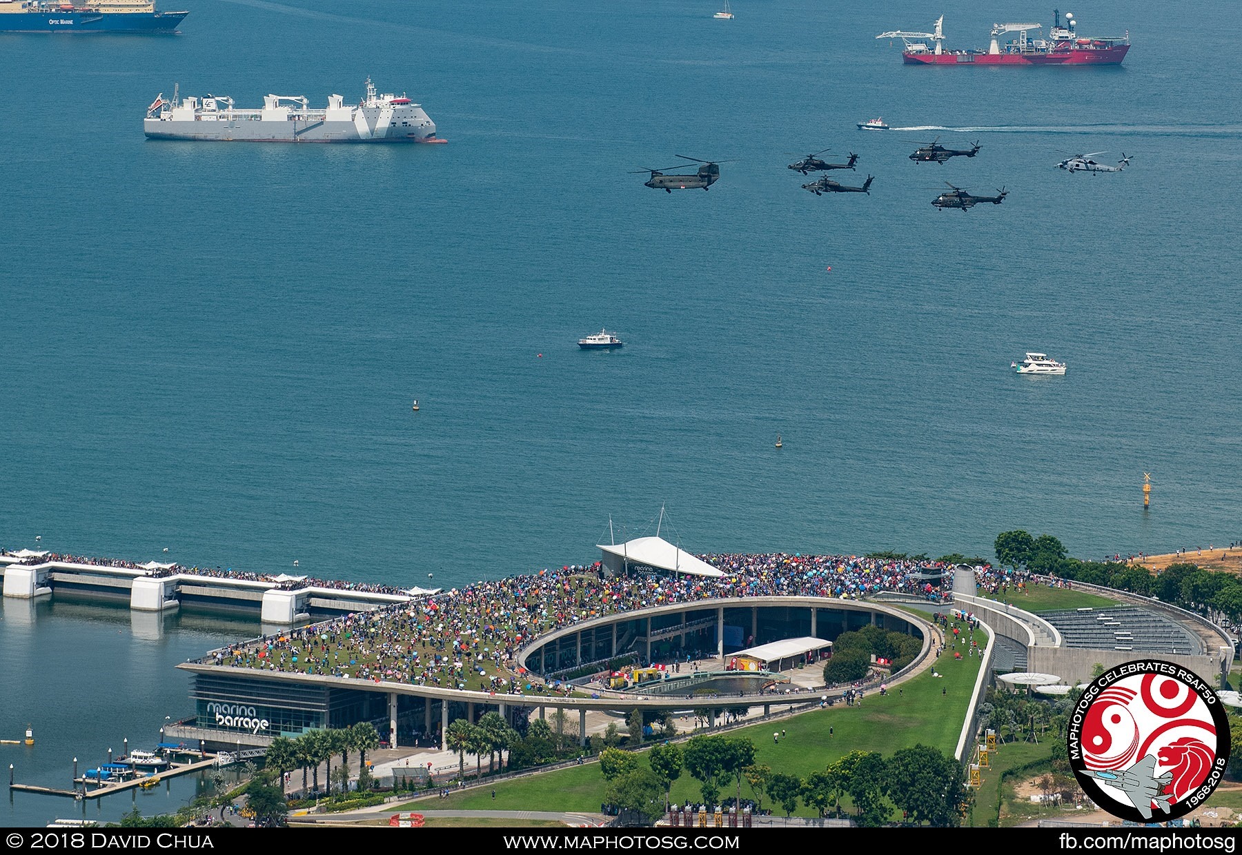 Helicopter formation flying over a packed Marina Barrage during the Saturday afternoon show.