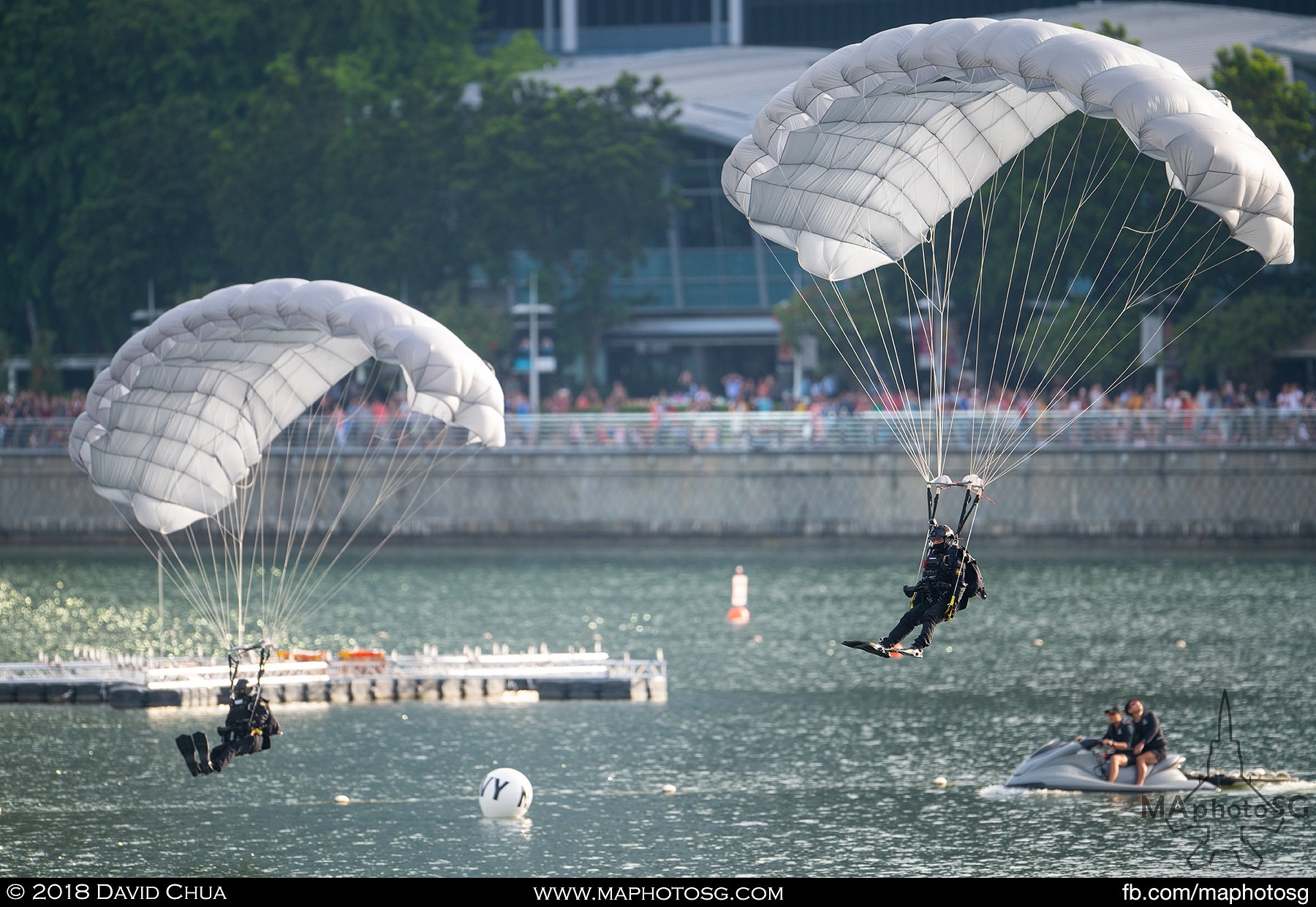 06. Two divers land into the waters around the Marina Bay floating platform.