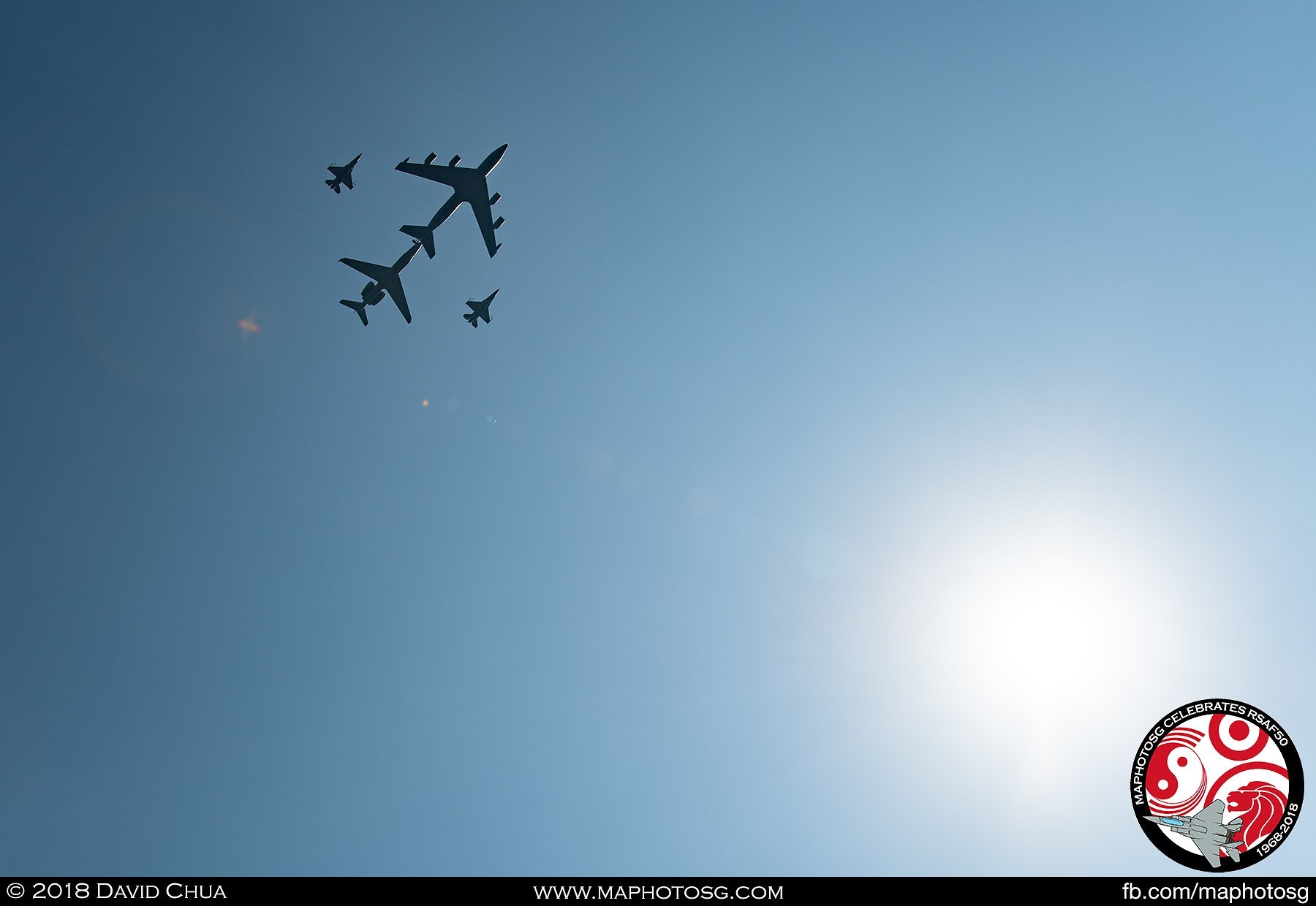 KC-135R Formation high above lighted by the afternoon sun