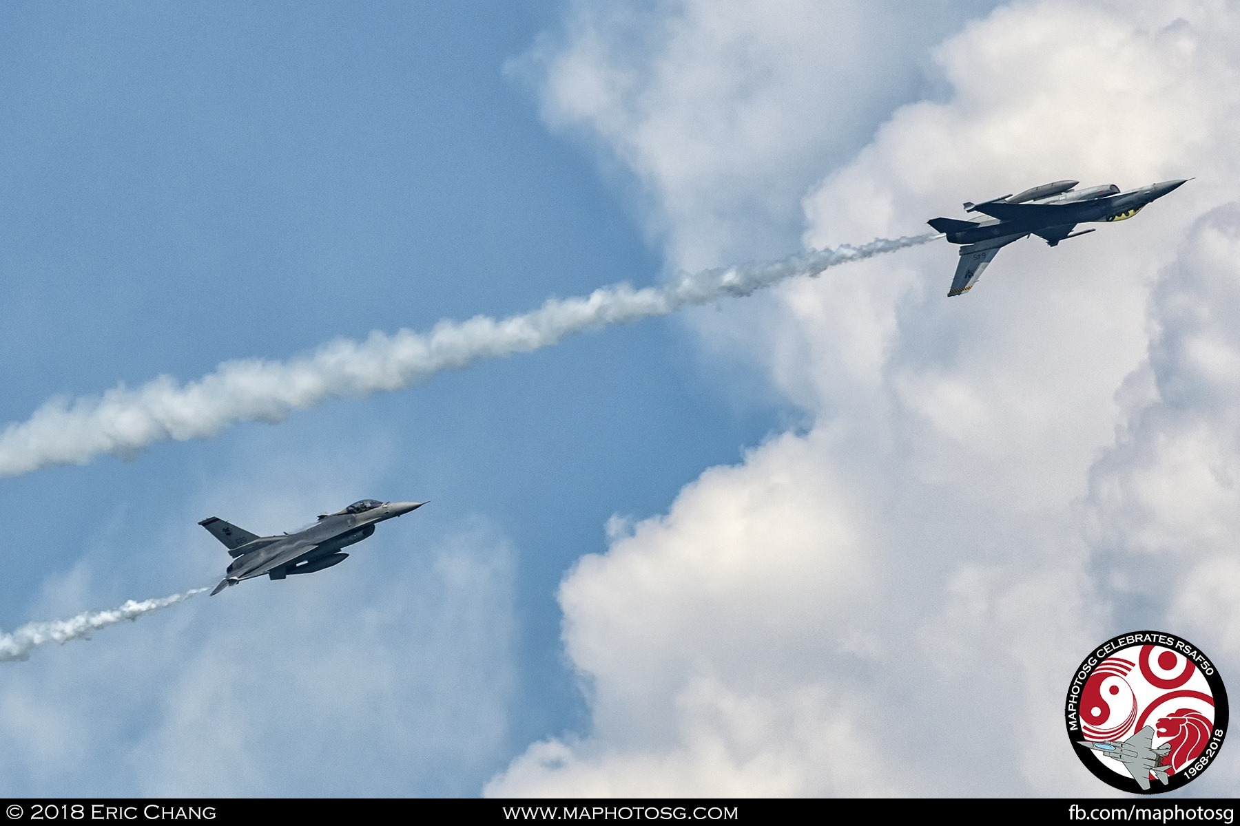 Inverted Helix – One of the F-16 flies inverted while the other executes a helix behind it.