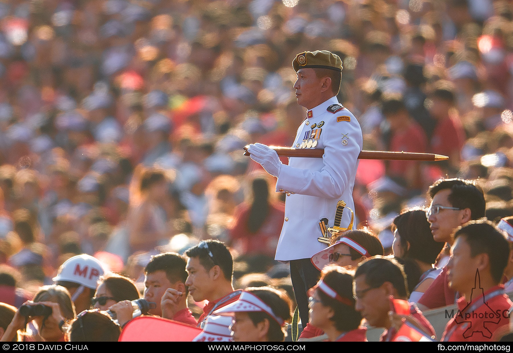 13. Nestled within the crowd, Parade Regimental Sergeant Major MWO Tay Ban Heng kicks of the Parade and Ceremony segment.