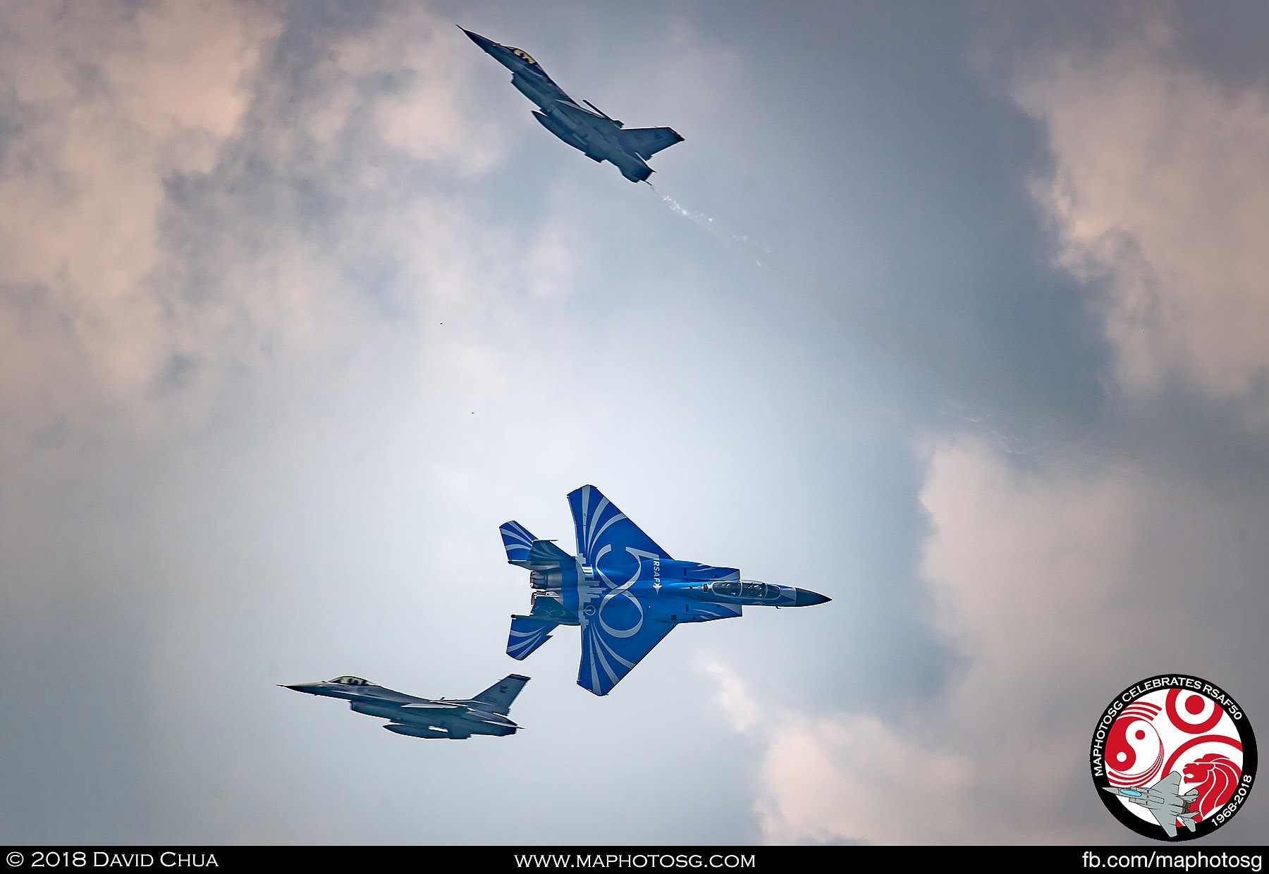 High Speed Pass – The F-15SG passes the two F-16Cs head on while one of the F-16C performs a muscle climb.