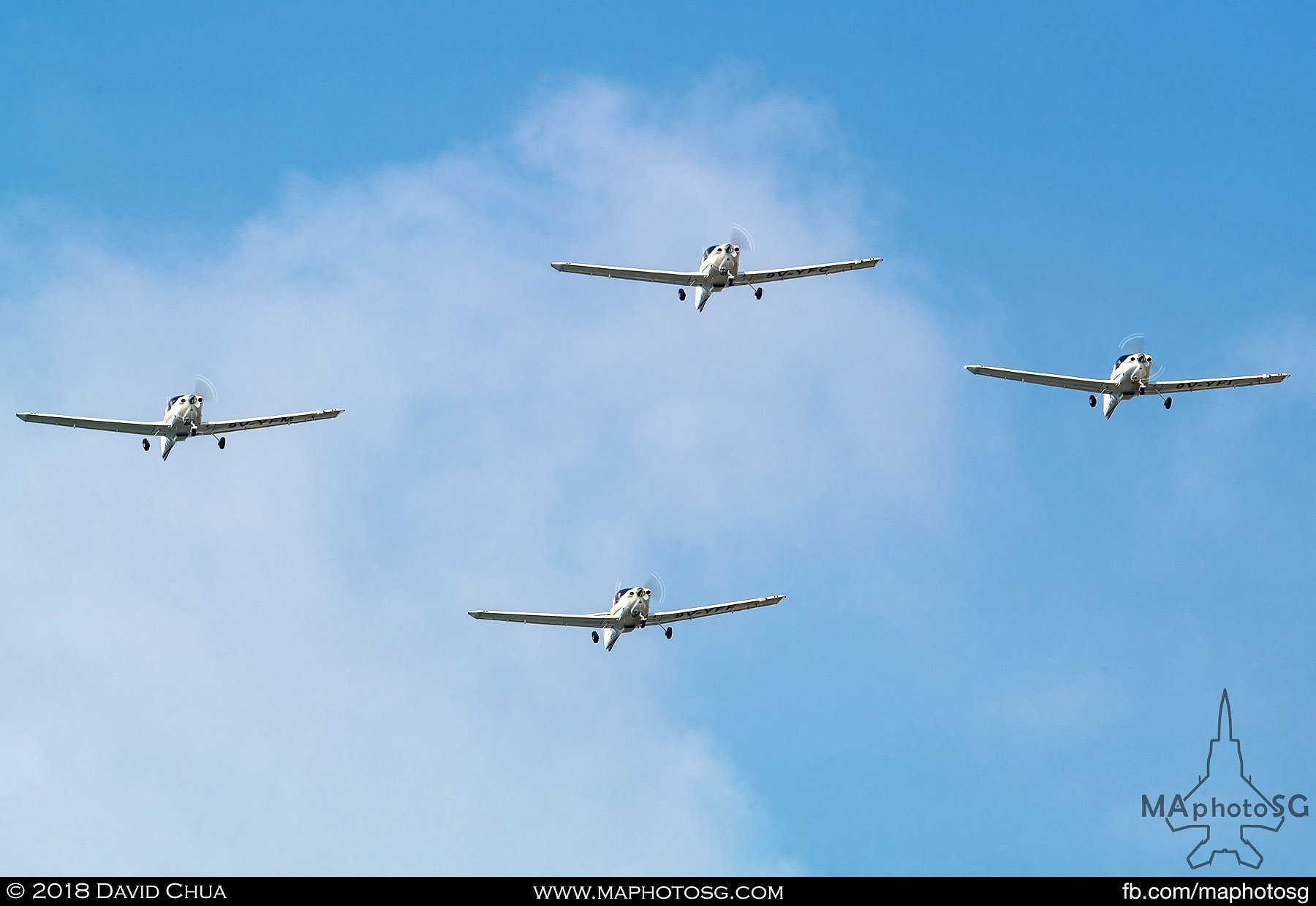 Singapore Youth Flying Club Diamond DA40 in diamond formation