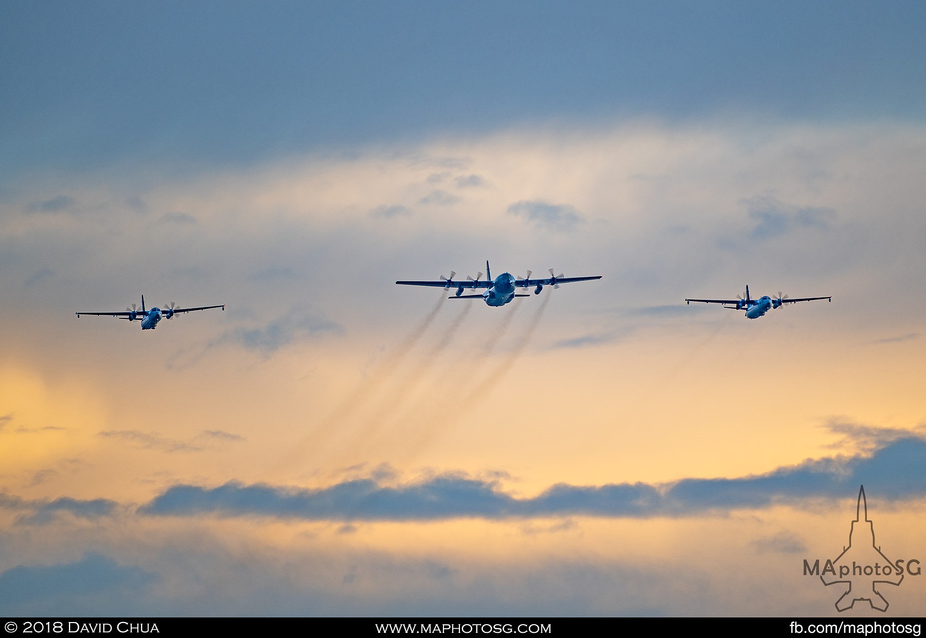 26. Transport formation of a C-130H Hercules flanked by two Fokker 50 Maritime Patrol Aircraft.