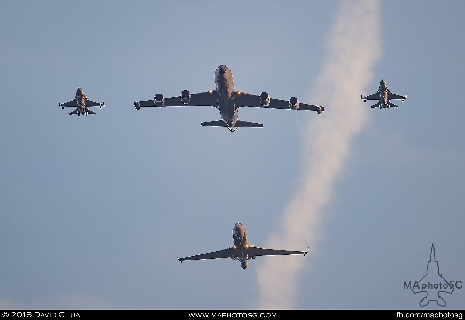 27. KC-135R Stratotanker escorted by to F-16C Vipers followed by a Gulfstream G550 CAEWS.