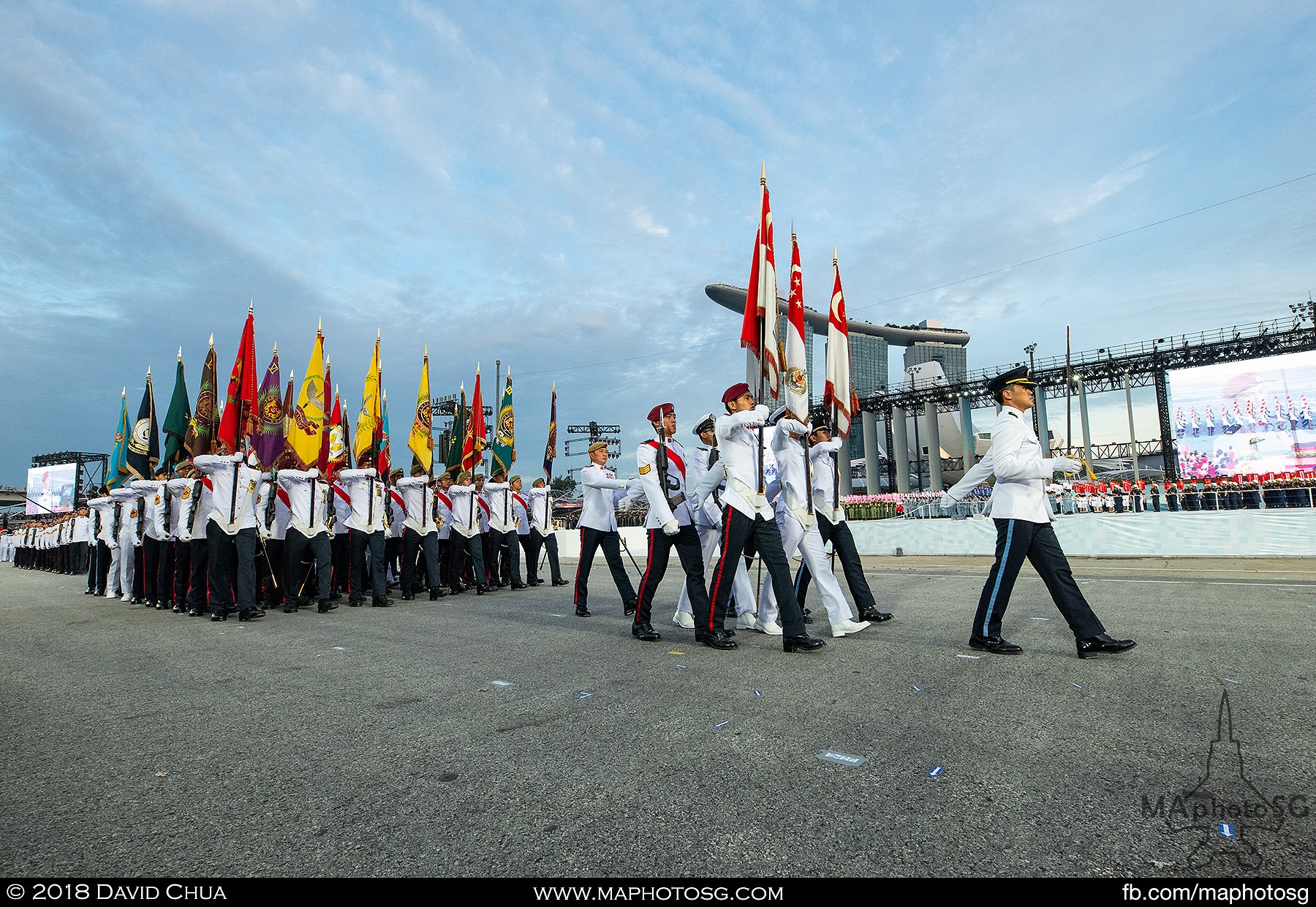 34. Parade Commander LTC Shawn Ingkiriwang leads the Colours Party as they march past the Floating Platform.