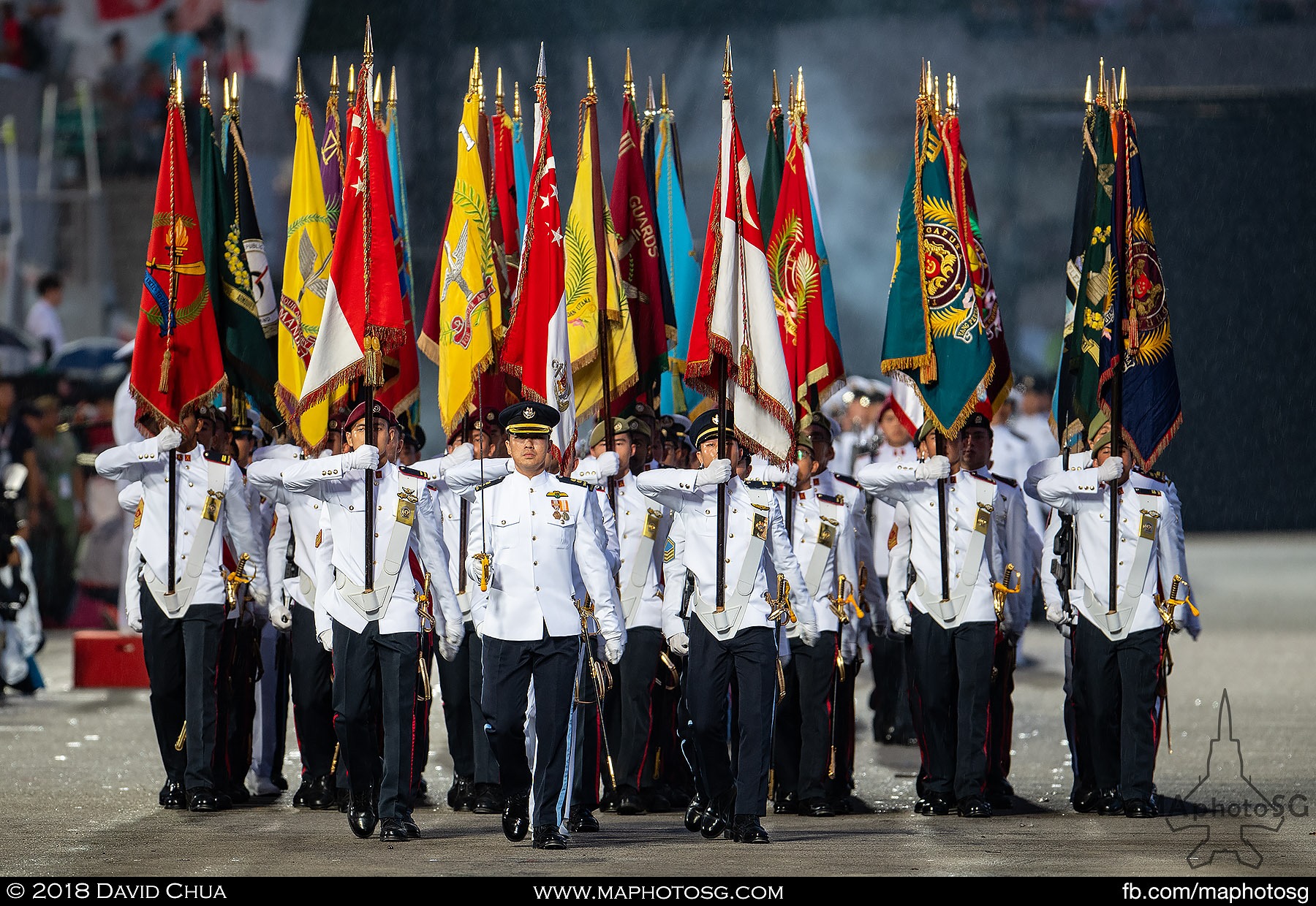 35. Front view as the Guard of Honour contingents march past the floating platform.