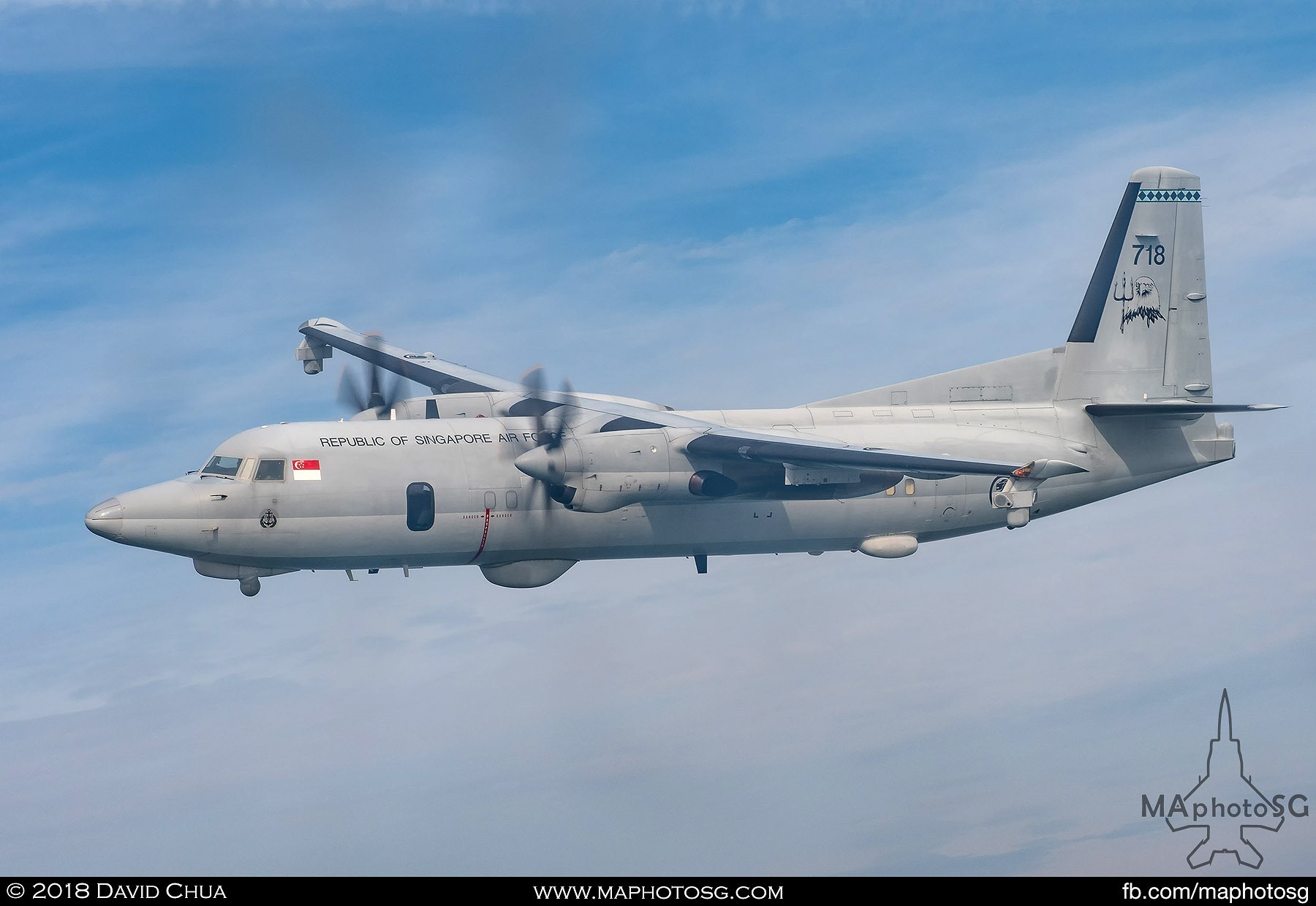 Fokker 50 MPA on the right side of the C-130H Hercules as it enters show center