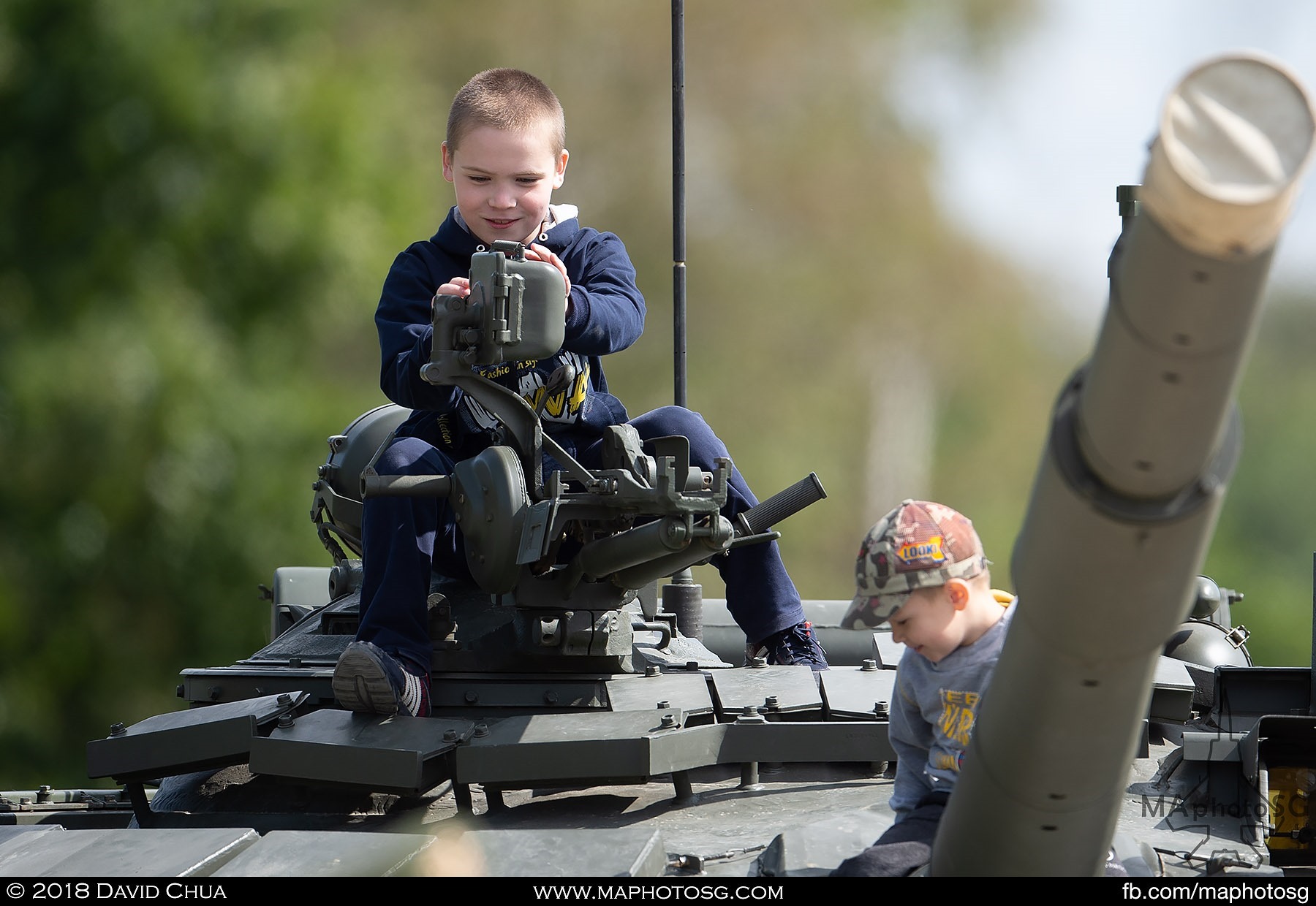 10. Children checks out the static display tanks after the live firing demonstrations at the Alabino Live Firing Range.