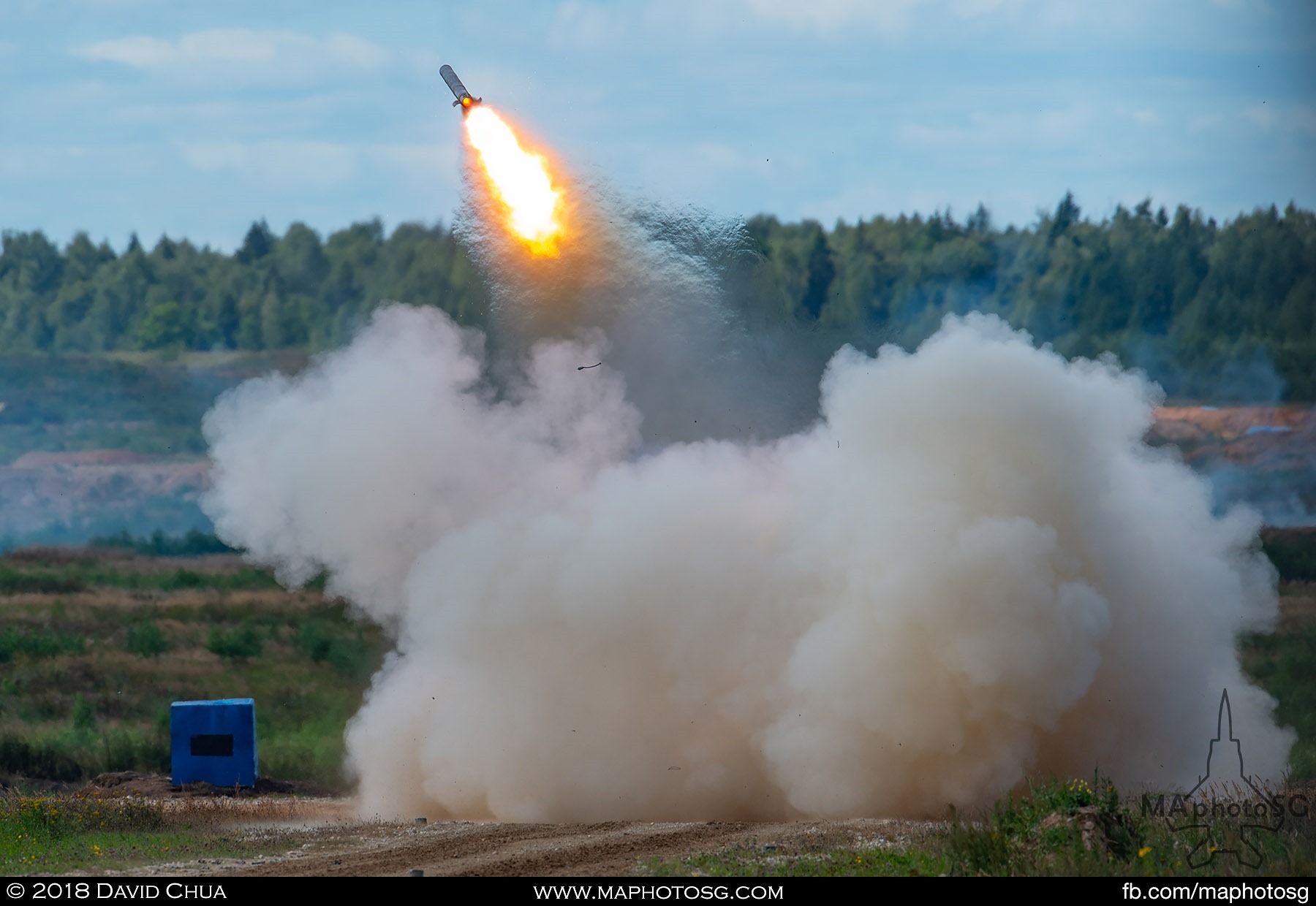 13. The first 220mm rocket leaves the TOS-1A covered in smoke and dust