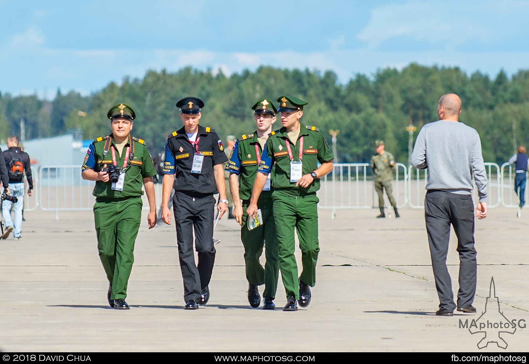 30. Base personnel in Kubinka Airfield going around taking pictures of the event