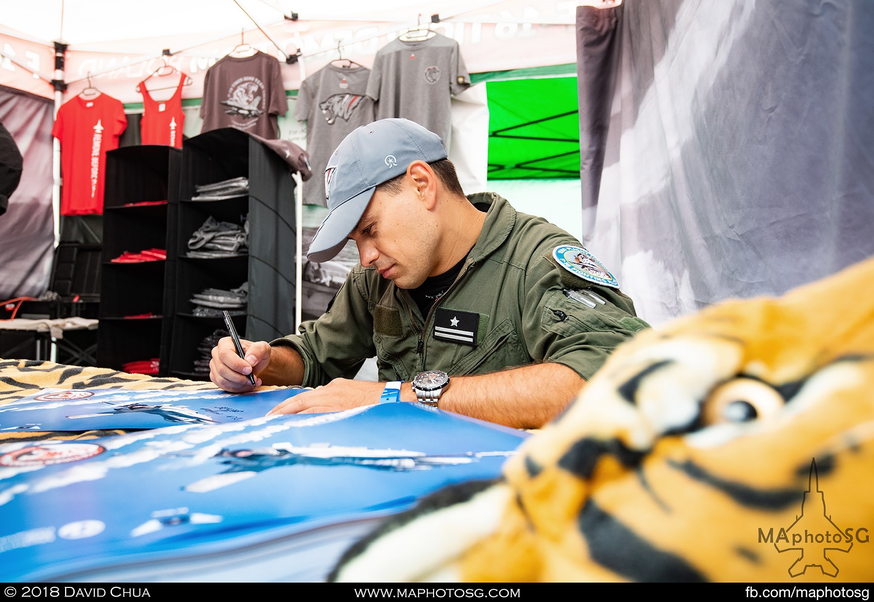 07. Signing the posters for fans of the Polish Air Force F-16 Tiger Demo Team